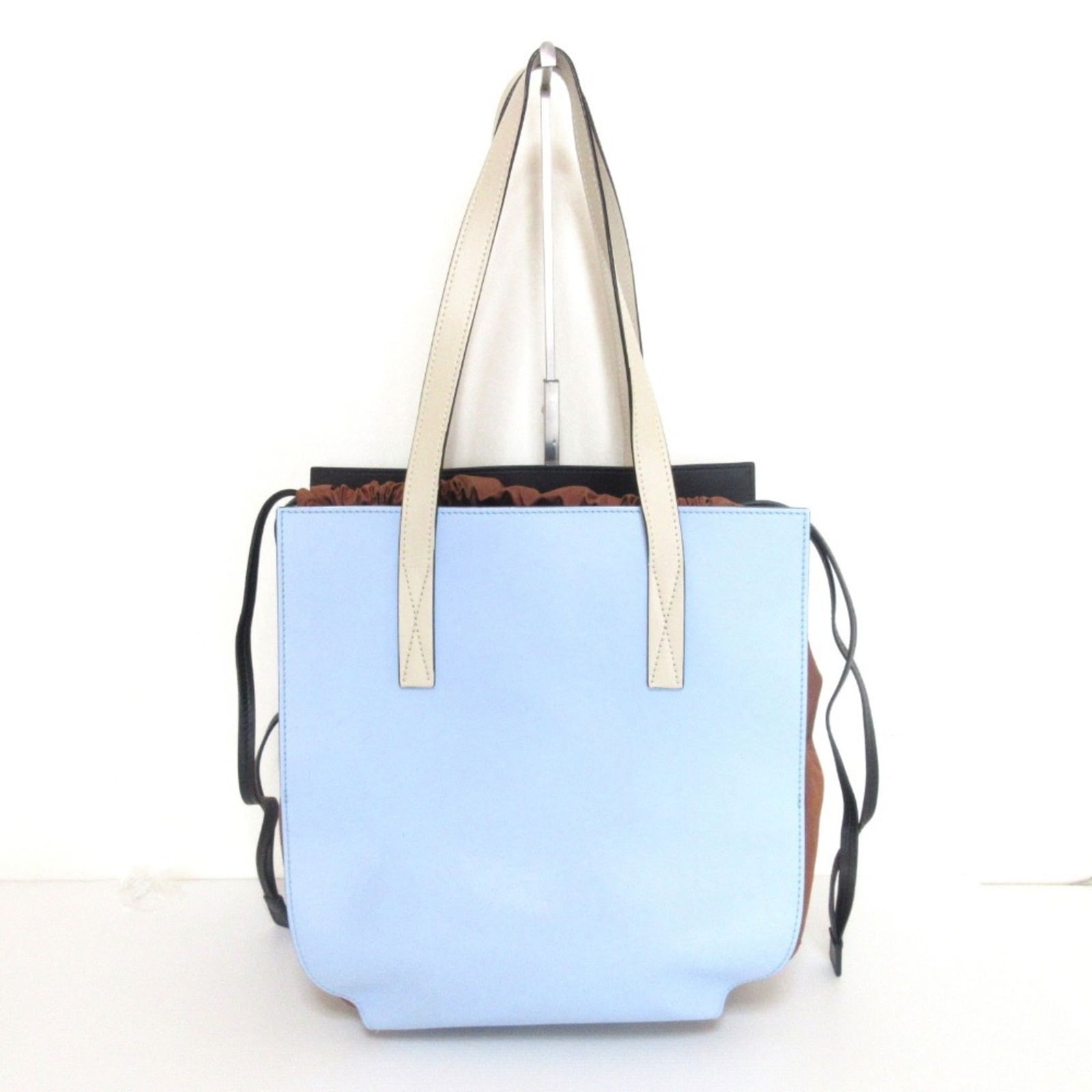 Marni Gusset Leather Drawstring Tote Bag One Shoulder Light Blue X Brown: Brand: Marni Type: Shoulder Bag, Tote Bag Material: Leather Color: Black, Brown, Light Blue, White Closure: String Inner Pocket: Open Pocket Gender: Women Size (Hxwxd): 31cm x 29cm x 18cm / 12.2'' x 1