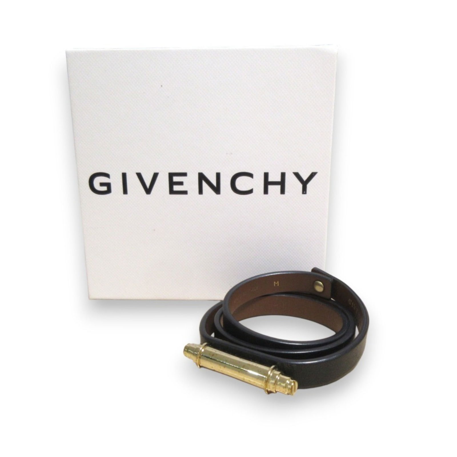 Givenchy Obsedia Leather Bracelet: Brand: Givenchy Type: Charm Bracelet Gender: Women Material: Leather Color: Black, Gold Length: 23cm / 9.05'' Condition: Used (very good), A few traces of usage, some scratches / dirt can be seen but