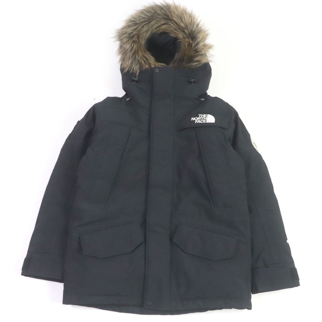 The North Face Down Jacket Nd92032 Outer: Material: Nylon Gender: Mens Brand: THE NORTH FACE Item: Down jacket Model: Antarctica Parka Gender: mens Color: black Material: Outer: 100% nylon, Lining: 100% polyester, Cuffs: 59% acrylic, 26% wool
