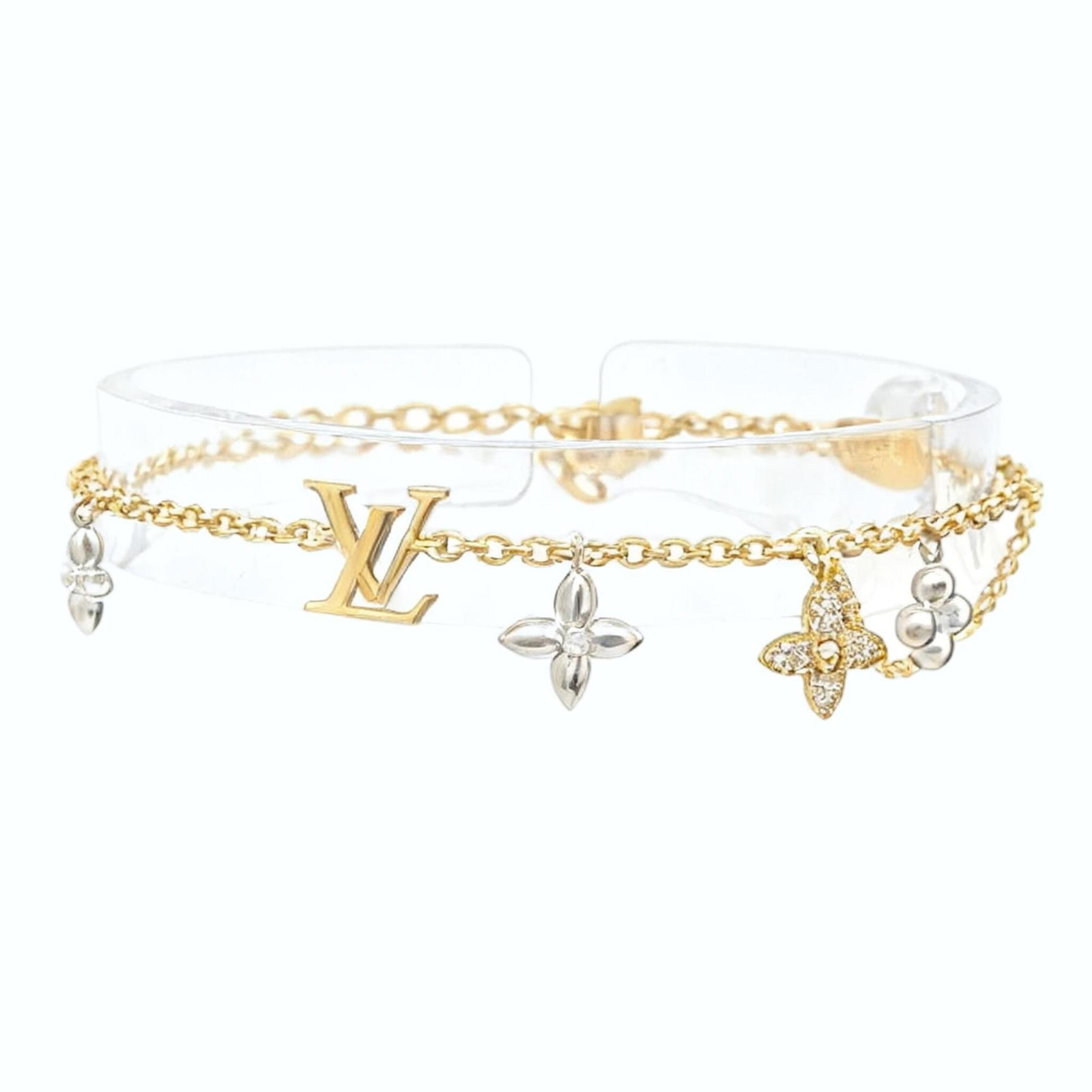 Louis Vuitton Monogram Charm Bracelet In Gp Metal Plated Gold (M1044A): Brand: Louis Vuitton Type: Charm Bracelet Gender: Women Material: Metal Color: Gold, Silver Length: 15cm - 18cm / 5.9'' - 7.08'' Condition: Used (very good), A few traces of usage, some scratches / di