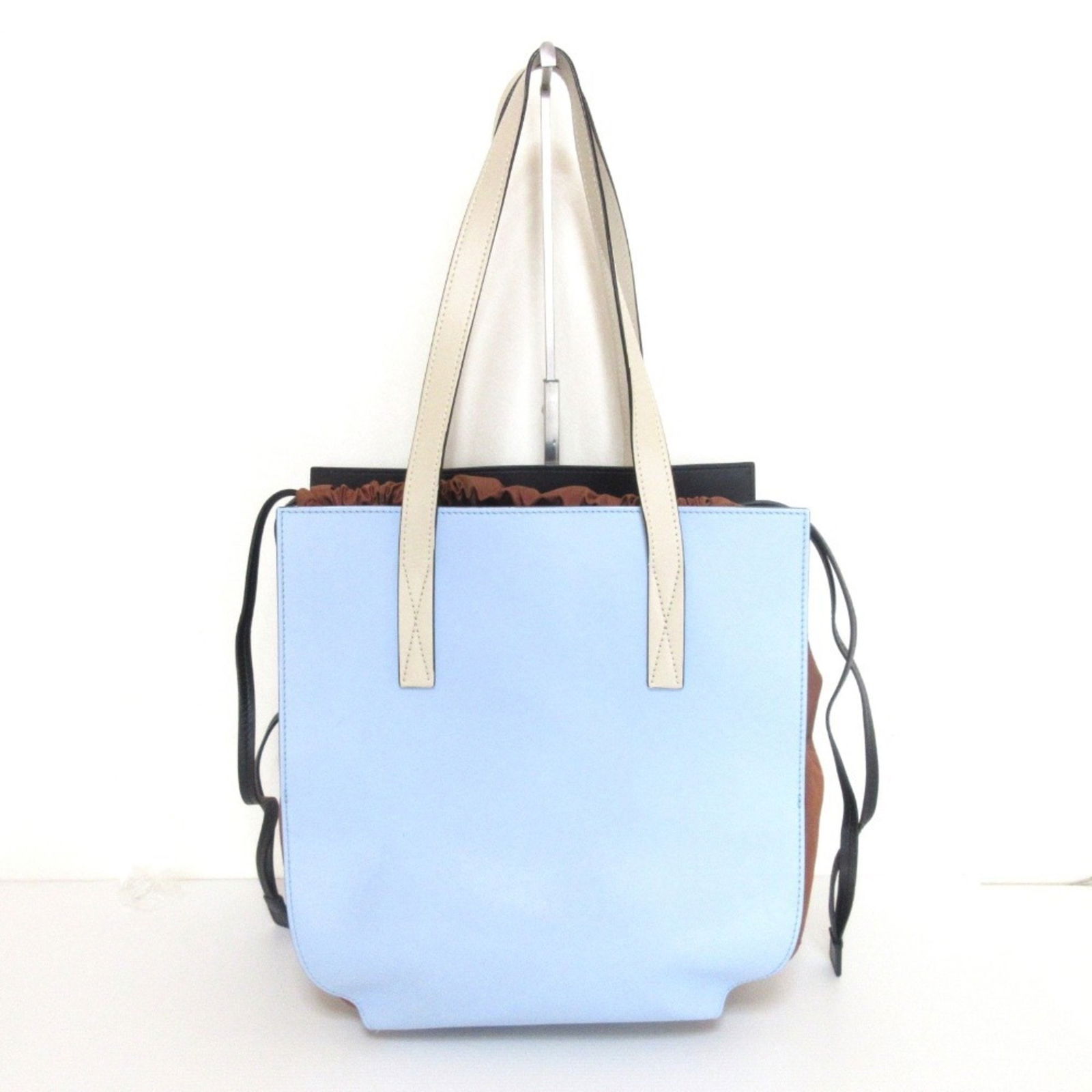 Marni Gusset Leather Drawstring Tote Bag One Shoulder Light Blue X Brown: Brand: Marni Type: Shoulder Bag, Tote Bag Material: Leather Color: Black, Brown, Light Blue, White Closure: String Inner Pocket: Open Pocket Gender: Women Size (Hxwxd): 31cm x 29cm x 18cm / 12.2'' x 1
