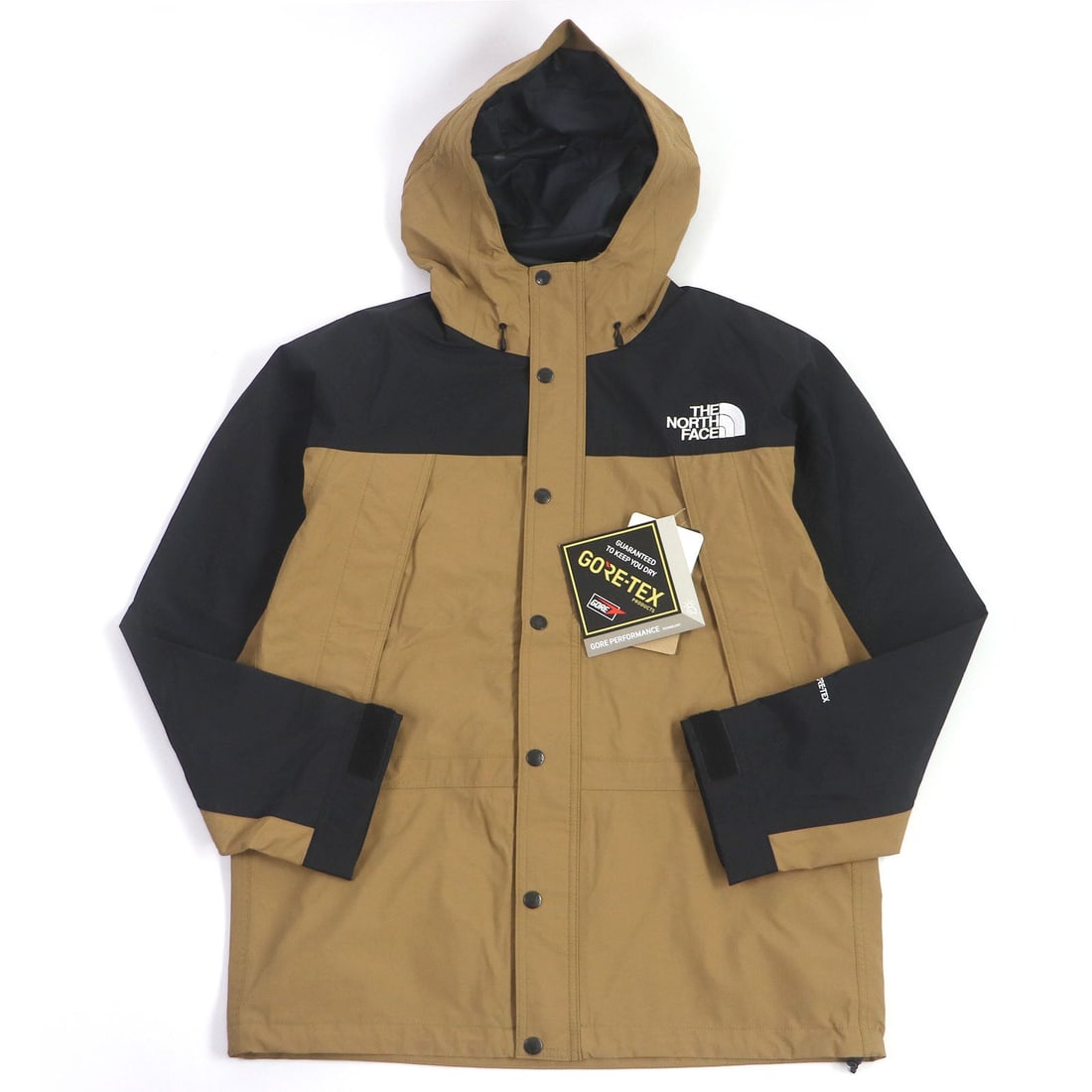 The North Face Nylon Jacket Np11834 Outer: Material: Nylon Gender: Mens Brand: THE NORTH FACE Item: Nylon jacket Model: Mountain Light Jacket Gender: mens Color: Utility brown Material: Outer: 100% nylon, Lining: 100% polyester Accessories: ta