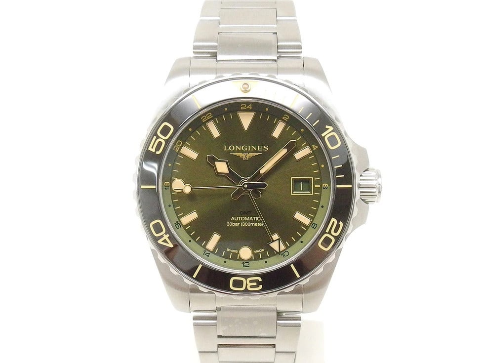 Longines L3.790.4.06.6 Hydroconquest Gmt Black Ceramic Bezel: Brand: LONGINES Movement: Automatic Dial Color: Sunray Green Material: SS/Bezel: Black ceramic Type: Wrist watch Product Disclaimer: Items may exhibit light wear, such as minor scratches or slight tar