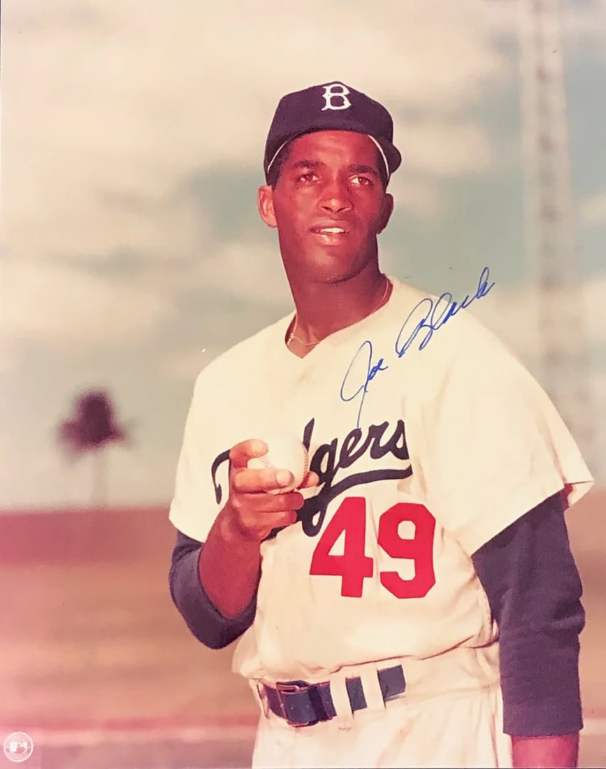 Joe Black Autographed 8X10 Photo: Joe Black Autographed 8x10 Photo-Brooklyn Dodgers.Signed in sharpie across the front of the photo Autograph is authenticated by , and will be accompanied by a COA from . Product Disclaimer: Not affili