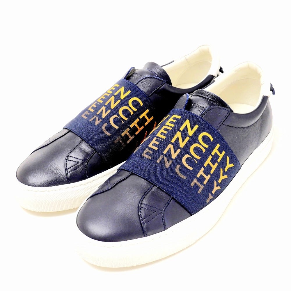 Givenchy Slip-On Leather Navy Yellow Type: Material: Leather Gender: Mens Brand: GIVENCHY Item: Slip-on Model: DN0158 Gender: mens Color: Navy Yellow type Beige type Material: leather Accessories: None Notation Size: 40 / US size?7 Shoe Size C