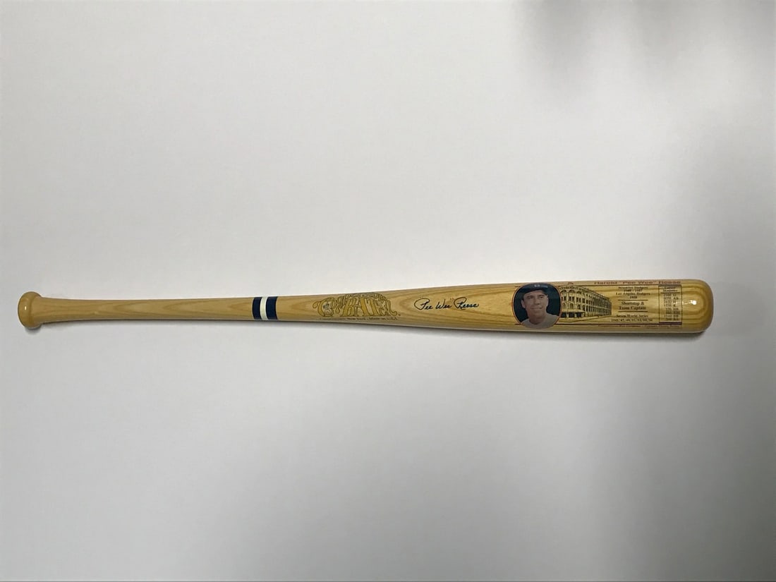 Pee Wee Reese Autographed Cooperstown Baseball Bat: Pee Wee Reese Autographed Baseball Signed in blue pen across the sweet spot of an official NationalLeague William D White baseball Authenticity is provided by Rich Altman's and will be accompanied wit