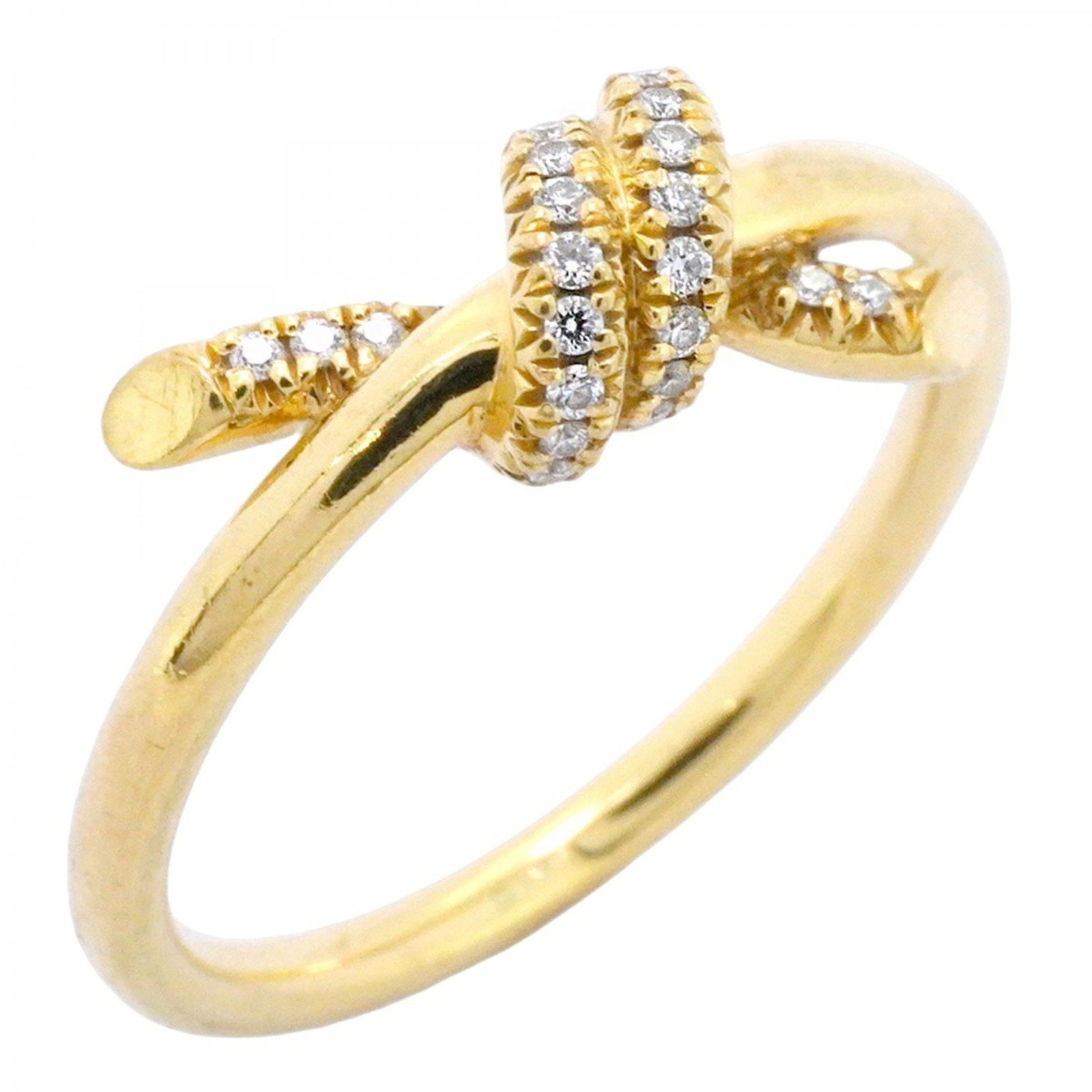 Tiffany Knot Ring: Brand: Tiffany Type: Band Ring Gender: Women Material: Yellow Gold (18K) Stone: Diamond Us Size: 5 Condition: Used (good), Traces of usage, scratches / dirt can be seen but generally in good condition
