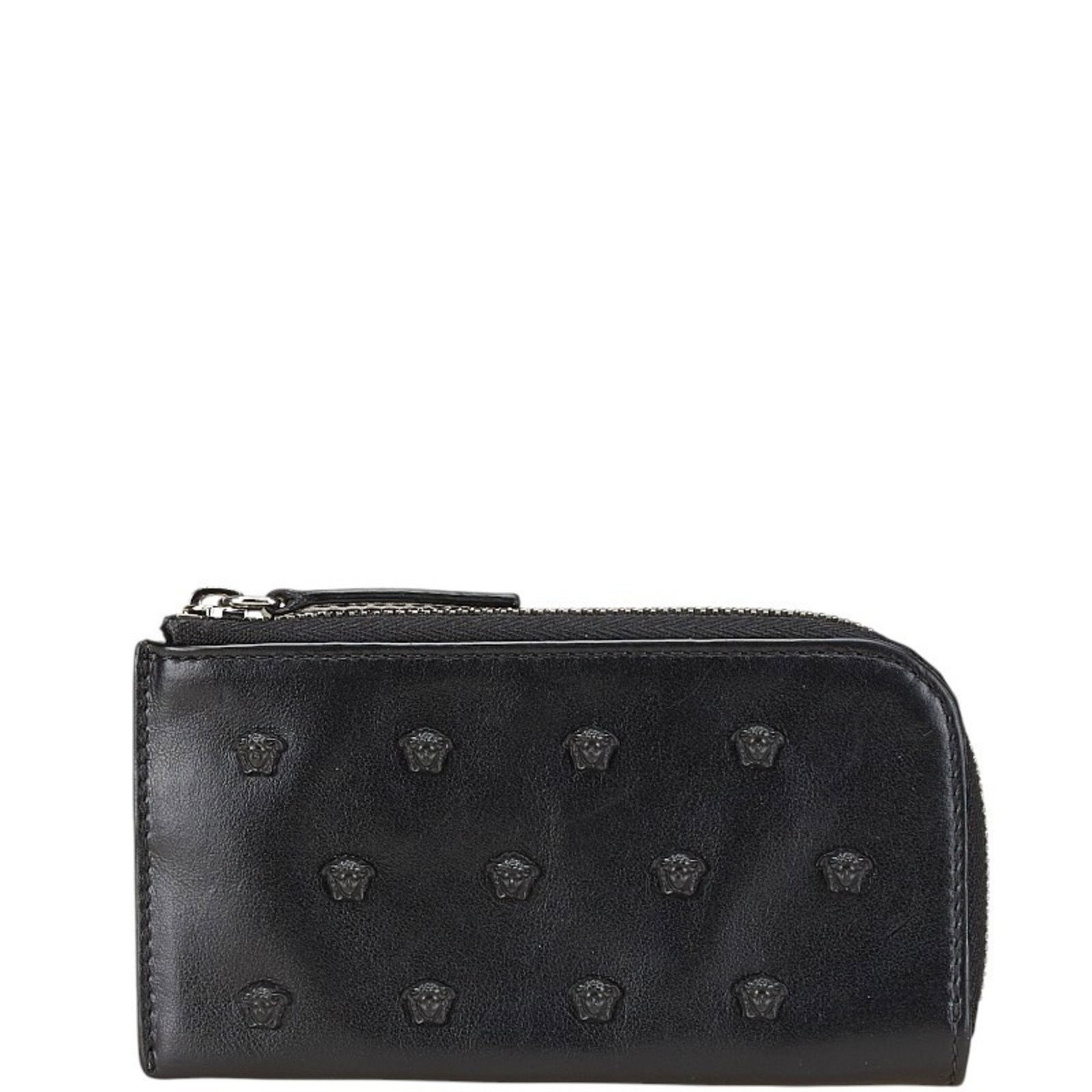 Versace Medusa Wallet/Coin Case Black Leather: Brand: Versace Type: Coin Purse/Coin Case Gender: Women Material: Leather Color: Black Size (Hxwxd): 7cm x 12.5cm x 1cm / 2.75'' x 4.92'' x 0.39'' Condition: Used (good), Traces of usage, scratches /