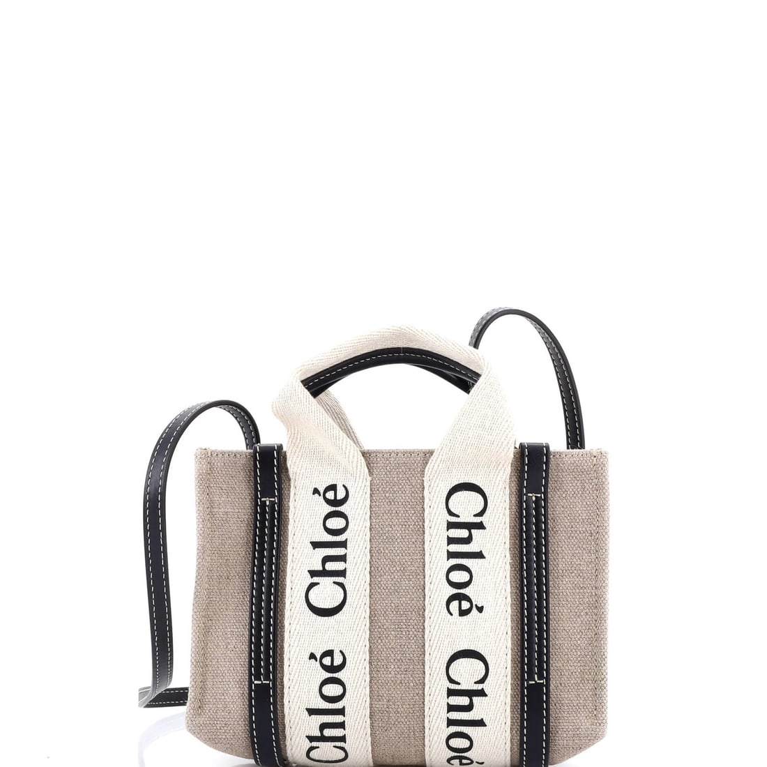 Chloe Woody Convertible Tote Canvas With Leather Mini: Brand: Chloe Exterior Material: Canvas Plain Leather Style: Totes Exterior Color: Black Size: Mini Measurements: Height 5.5", Width 8", Depth 3" Model: Woody Convertible Tote Canvas with Leather Mini