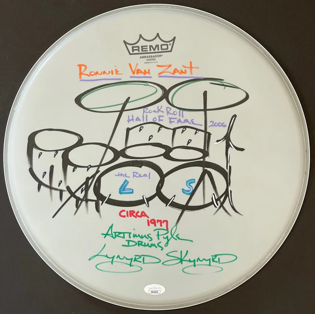 Artimus Pyle Autographed 14" Remo Drum Head (Jsa): Brand: James Spence Authentication (JSA) Artimus Pyle Autographed Remo 14" Drum Head (JSA) Inscribed with "Rock Roll Hall of Fame 2006,Lynyrd Skynyrd" inscriptions Signed in black & red sharpie across