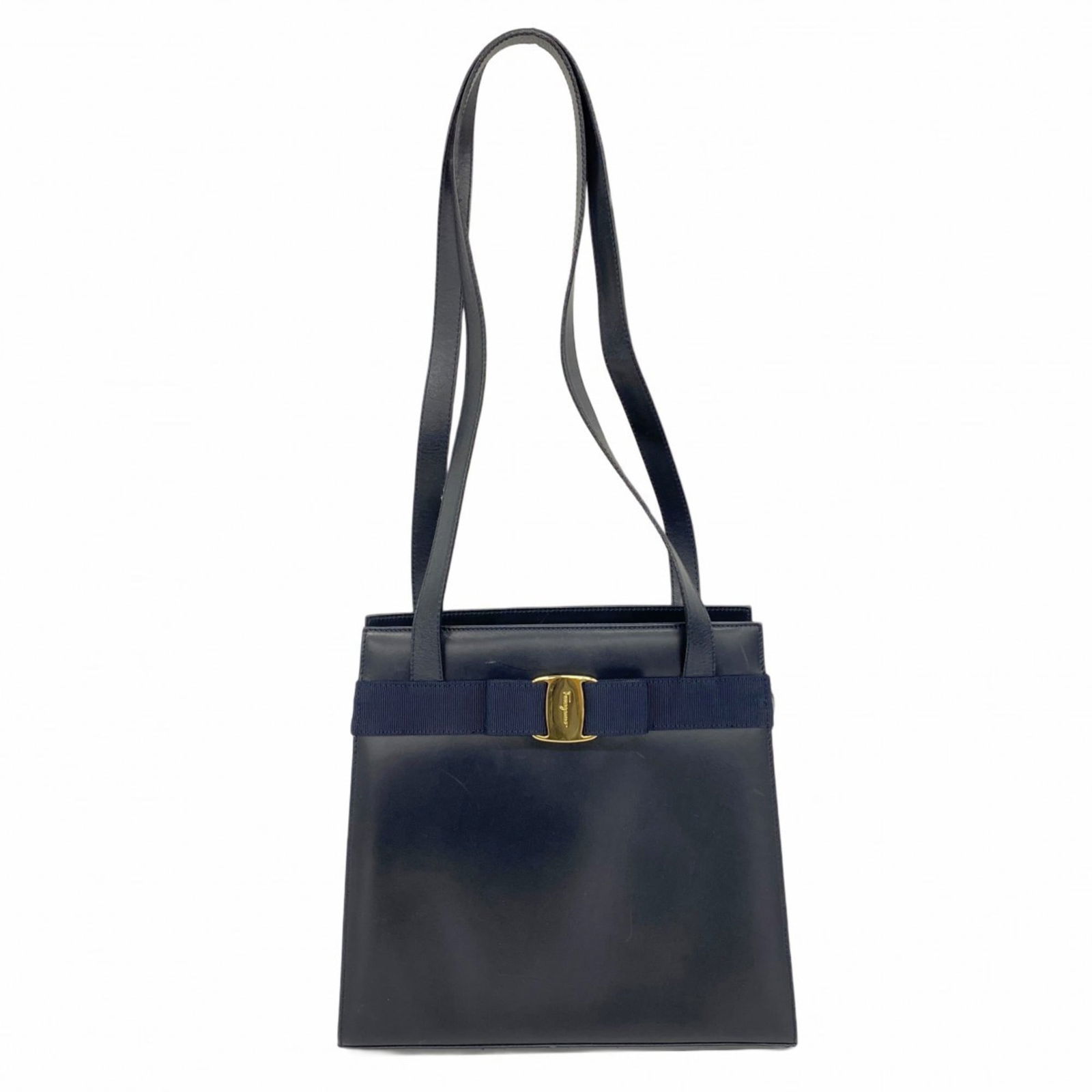 Salvatore Ferragamo Vara Leather Shoulder Bag In Navy Blue: Brand: Salvatore Ferragamo Type: Shoulder Bag Material: Leather Color: Navy Hardware Color: Gold Gender: Women Size (Hxwxd): 26cm x 28cm x 10cm / 10.23'' x 11.02'' x 3.93'' Condition: Used (good), Tra