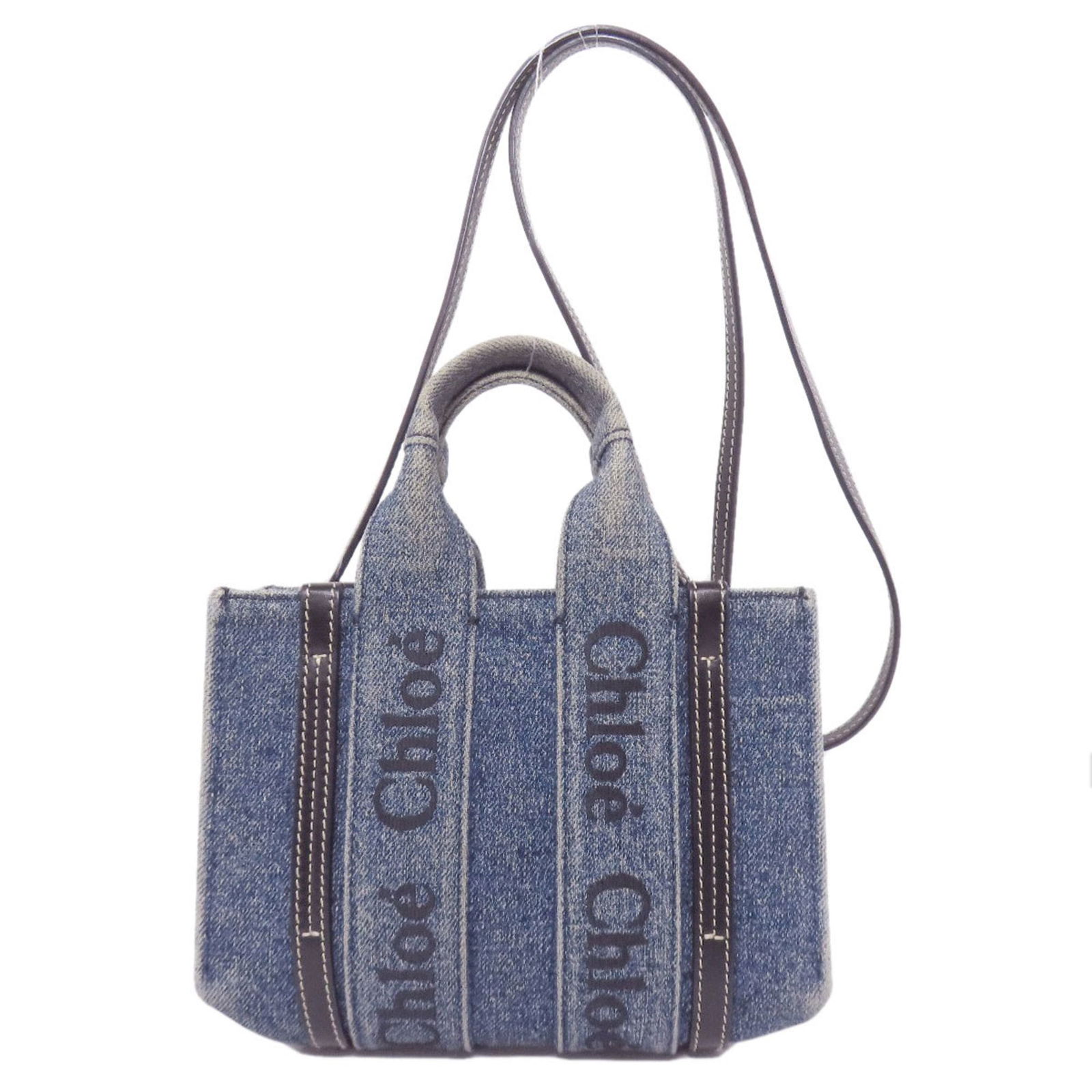 Chlo Chloe Woody Mini 2-Way Handbag In Denim: Brand: Chlo Type: Handbag Material: Denim , Leather Leather/Fur Type: Calfskin Color: Blue Gender: Women Size (Hxwxd): 13.5cm x 20cm x 6.5cm / 5.31'' x 7.87'' x 2.55'' Handle Length: 19cm / 7.48'' Str