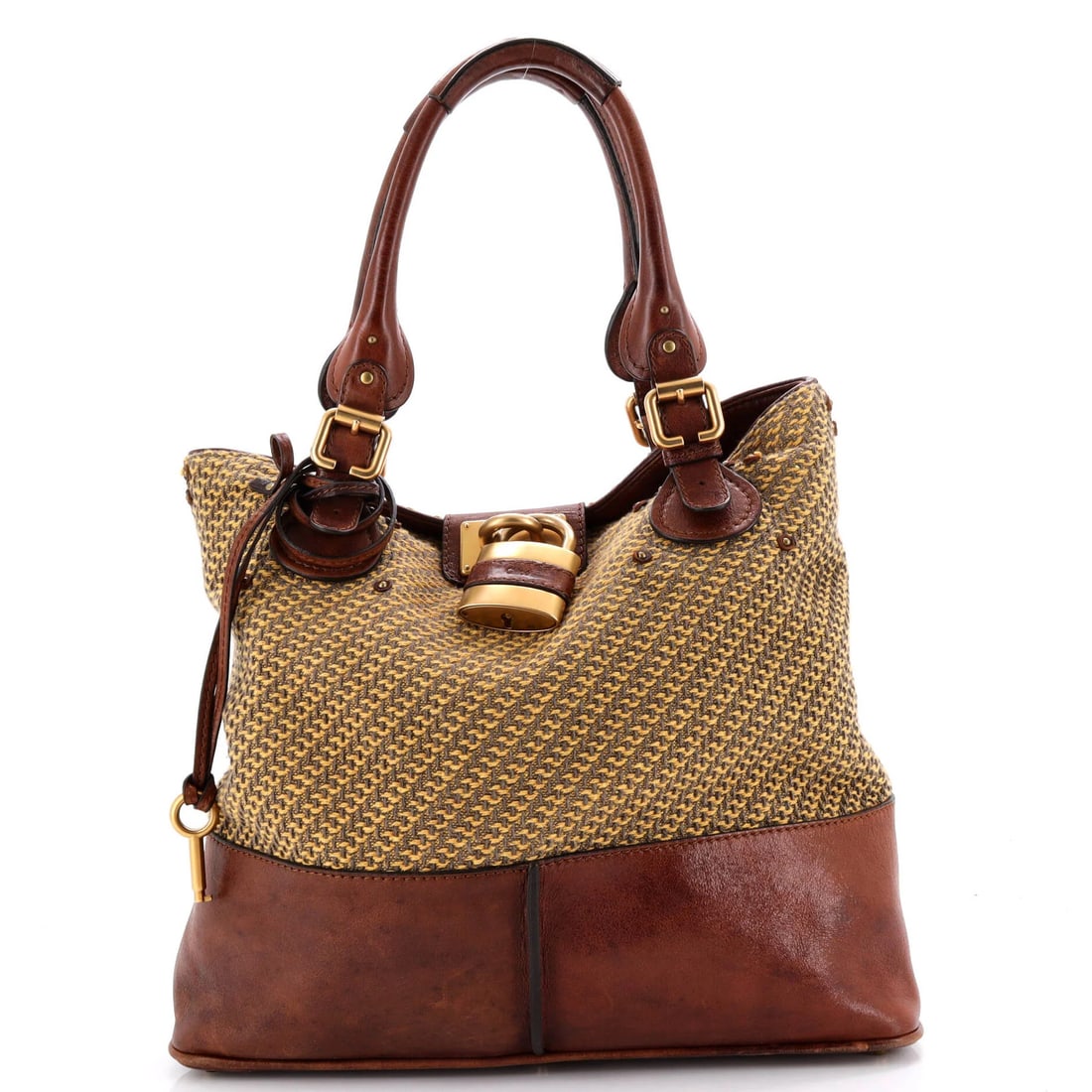 Chloe Paddington Tote Tweed And Leather Medium: Brand: Chloe Exterior Material: Leather Tweed Style: Totes Exterior Color: Brown Size: Medium Accessories: Padlock Keys Measurements: Height 10", Width 15", Depth 7" Model: Paddington Tote Tweed and L