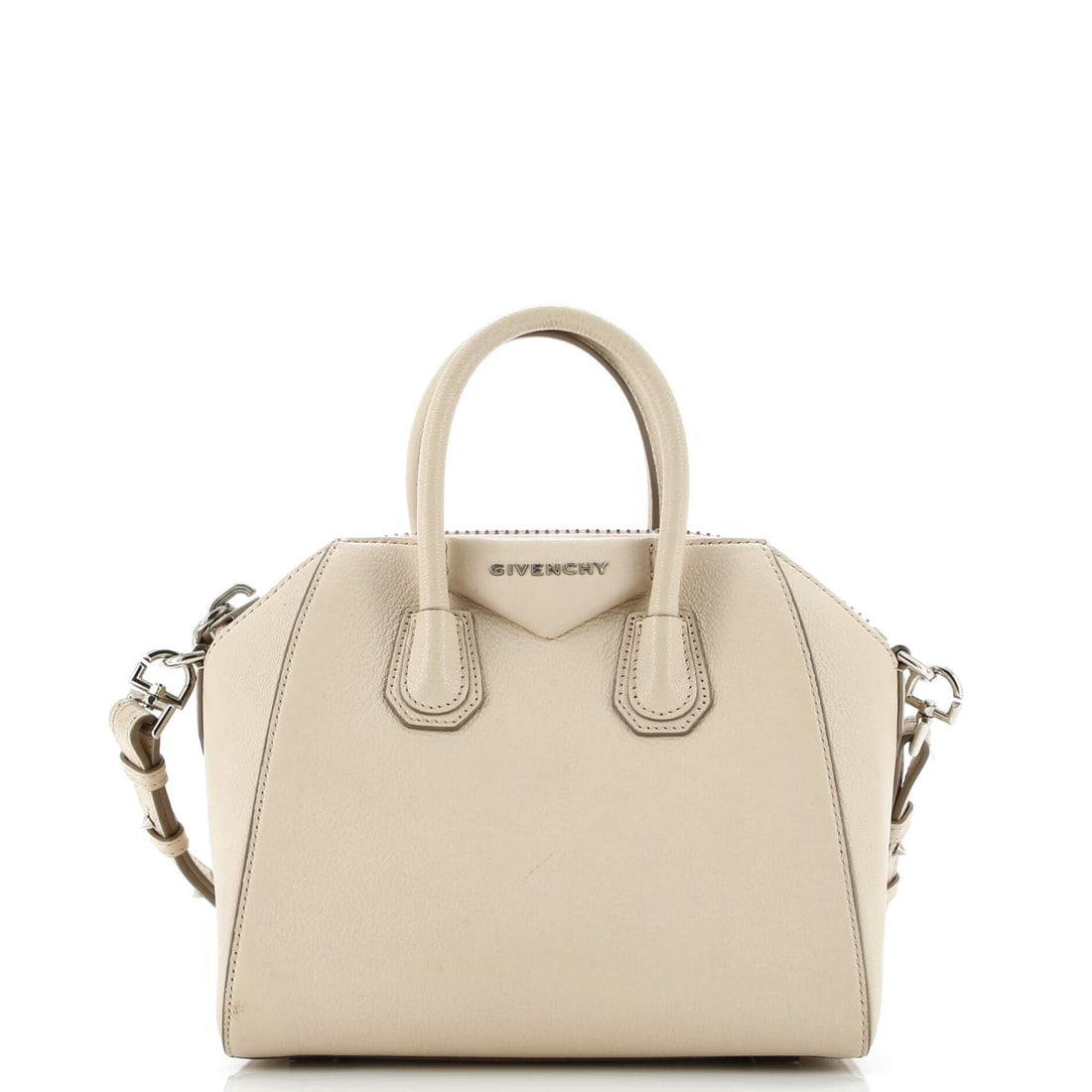 Givenchy Antigona Bag Leather Mini: Brand: Givenchy Exterior Material: Leather Style: Cross Body Bags Exterior Color: Neutral Size: Mini Measurements: Handle Drop 3", Height 7.5", Width 8.5", Depth 5", Strap Drop 19-23" Model: Antigona