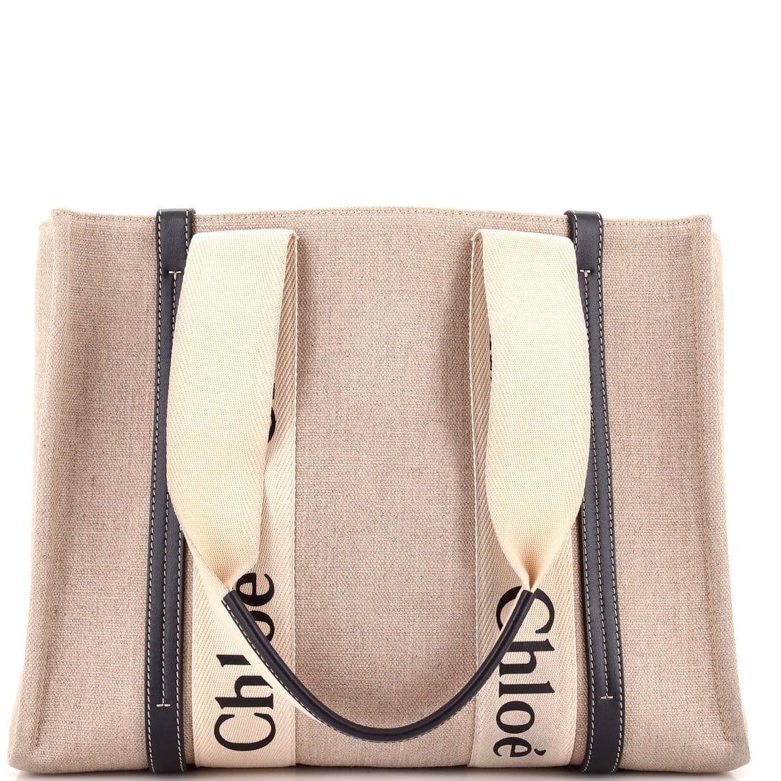 Chloe Woody Tote Canvas With Leather Medium: Brand: Chloe Exterior Material: Canvas Plain Leather Style: Totes Exterior Color: Neutral Size: Medium Measurements: Handle Drop 10", Height 10.5", Width 14", Depth 5", Strap Drop None" Model: Woody T