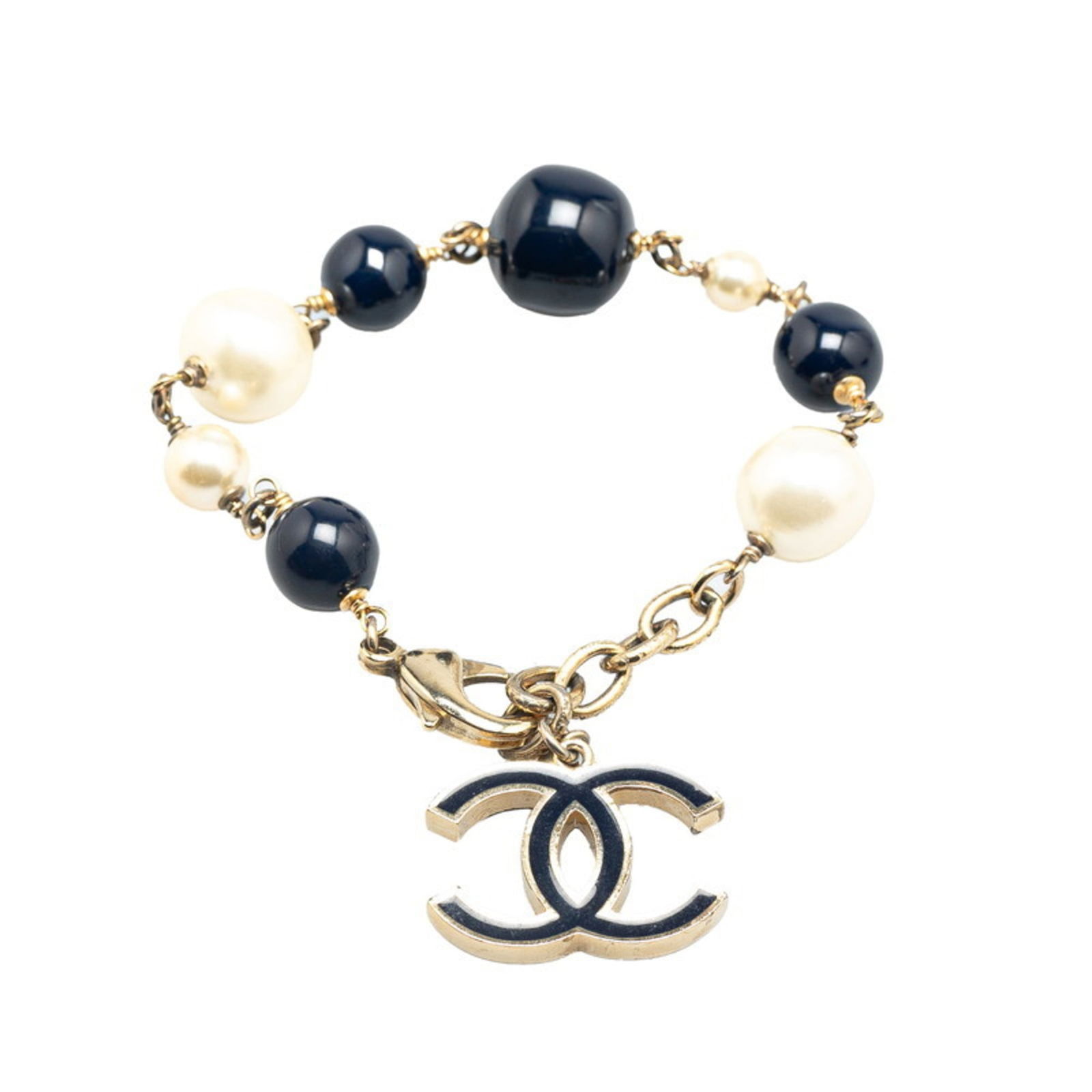 Chanel Coco Mark Bracelet In Navy: Brand: Chanel Type: Charm Bracelet Gender: Women Color: Gold, Navy Black Length: 18cm / 7.08'' Width: 4mm - 1.5cm / 0.15'' - 0.59'' Total Length: 24cm / 9.44'' Condition: Used (good), Traces of usage,