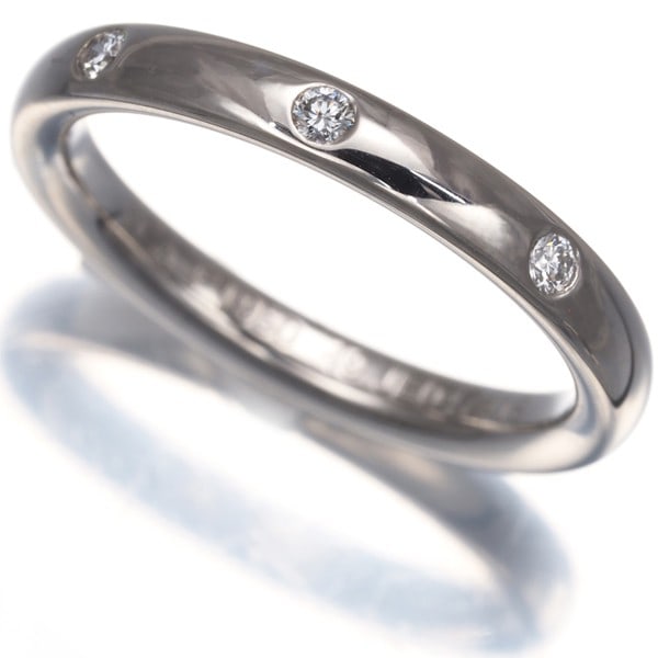 Van Cleef & Arpels Ring Diamond Infini Etoiles 3P Eu49 950 Platinum: Country Of Origin: France Brand: Van Cleef & Arpels Metal: Platinum Metal Purity: 950 Type: Ring Main Stone: Diamond Collection: Infini Main Stone Creation: Natural Ring Size: EU49 Product Disclaimer: