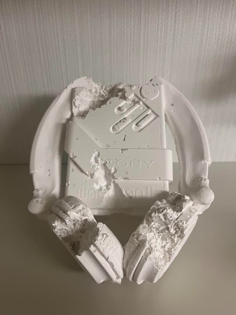 Daniel Arsham Future Relic 07 Cassette Player Walkman: Artist: Daniel Arsham Type: Sculpture Original/Licensed Reproduction: Original Size: Small Material: NA Subject: Headphones Product Disclaimer: Please review the full description and photos. Lithograp