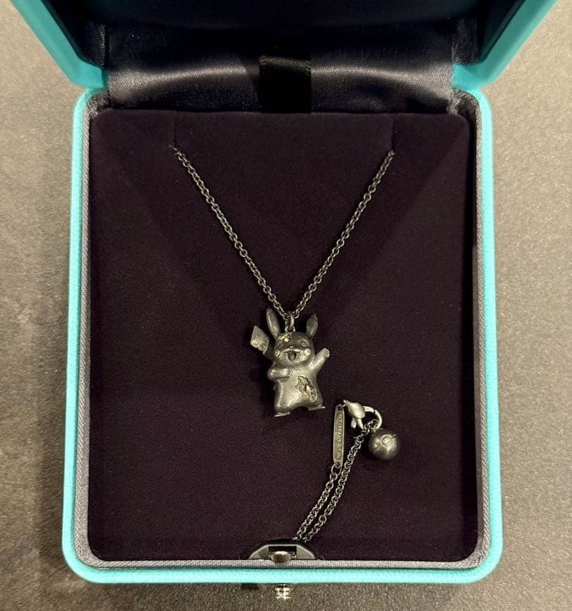 Tiffany Co & Daniel Arsham Spikachu Necklacepikachu Necklace New And Unused Item: Color: Oxidized Silver Main Stone Color: White Metal: Silver Secondary Stone: Diamond Main Stone: Diamond Brand: Tiffany & Co. Personalize: No Type: Necklace Metal Purity: 925 Customized: No Style: Pe