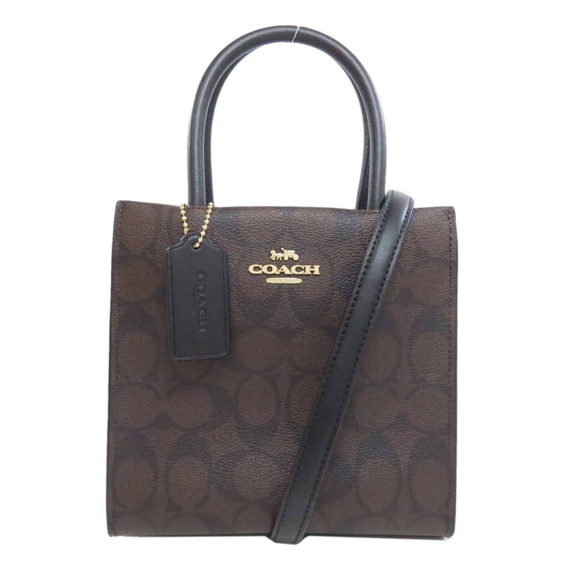 Coach 5693 Signature 2Way Handbag Pvc: Brand: COACH Style: Handbag Exterior Material: PVC Color: Brown x black Type: Handbag Exterior Color: Brown Product Disclaimer: Pre-owned unless stated. Expect minor wear consistent with use. Sizing m