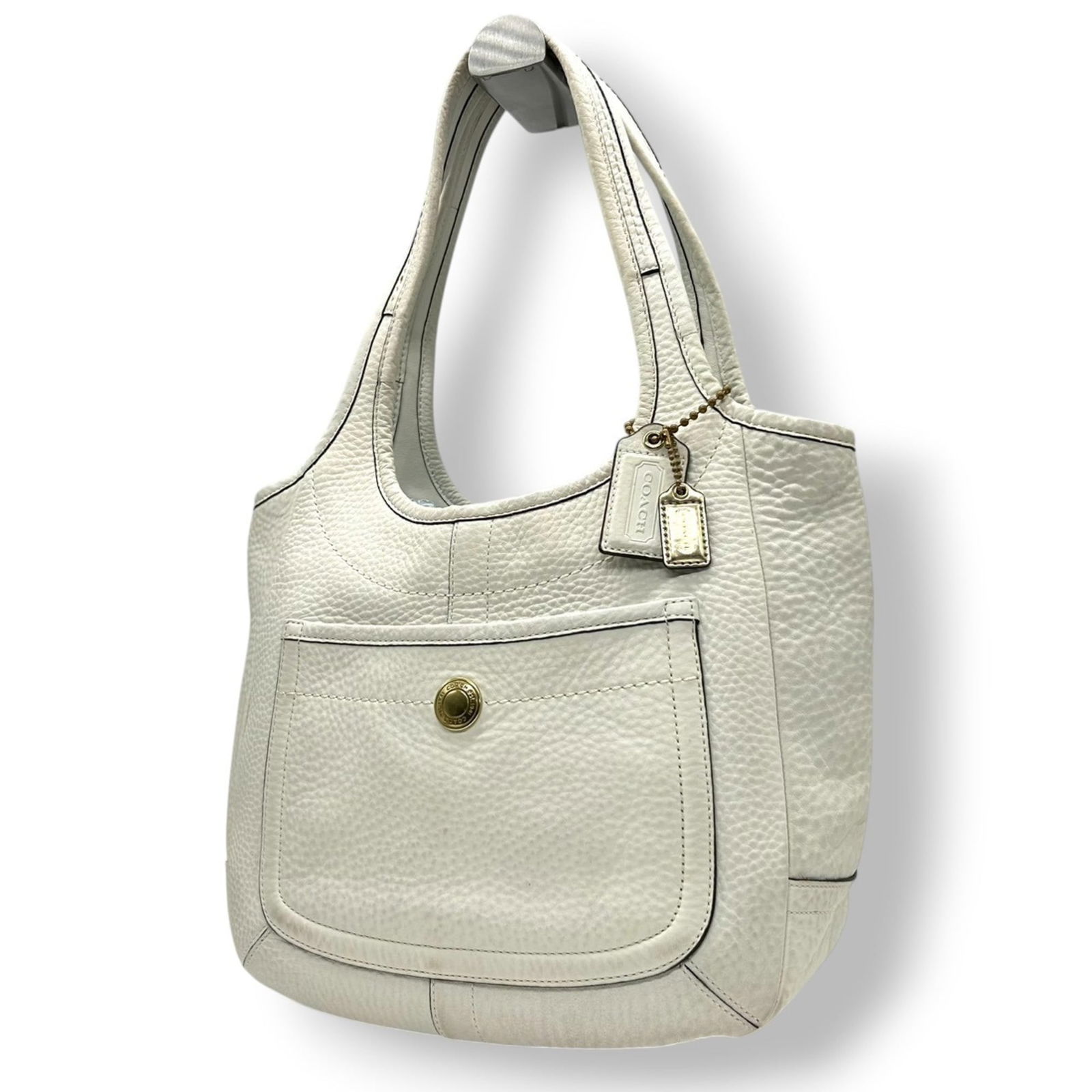 Coach Ergo 11615 Tote/Shoulder Bag In White Leather With Legacy Stripe: Brand: Coach Type: Shoulder Bag, Tote Bag Material: Leather Color: Ivory, White Gender: Women Size (Hxwxd): 22cm x 32cm x 12cm / 8.66'' x 12.59'' x 4.72'' Condition: Used (very good), A few traces of