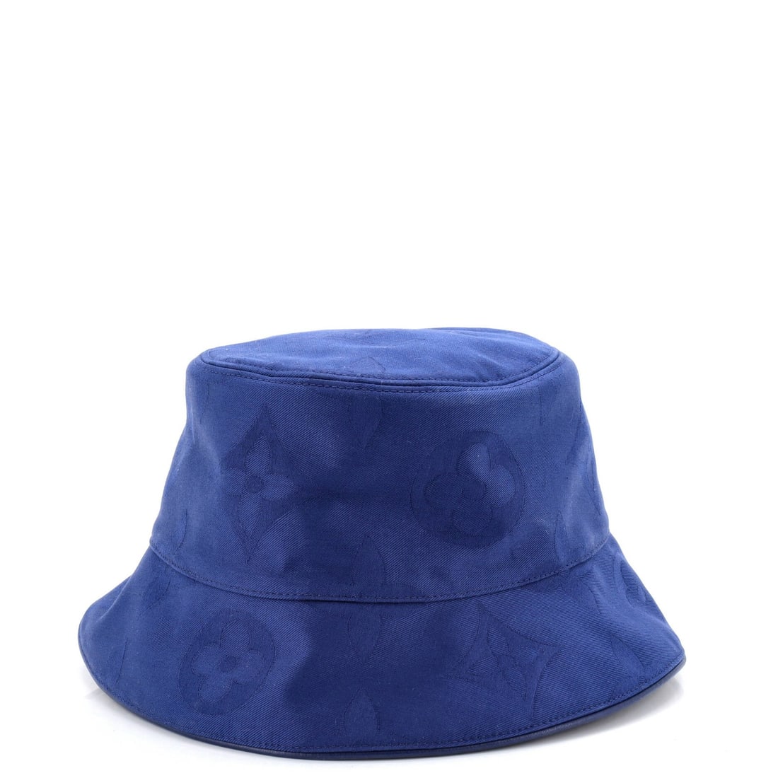 Louis Vuitton Monogram Flower Tile Reversible Hat Printed Cotton: Style: Printed Cotton Brand: Louis Vuitton Color: Blue Size: 67.5 Material: Cotton Measurements: Height 6", Width 21.5", Head Circumference 67.5" Model: Monogram Flower Tile Reversible Hat Printed Cot