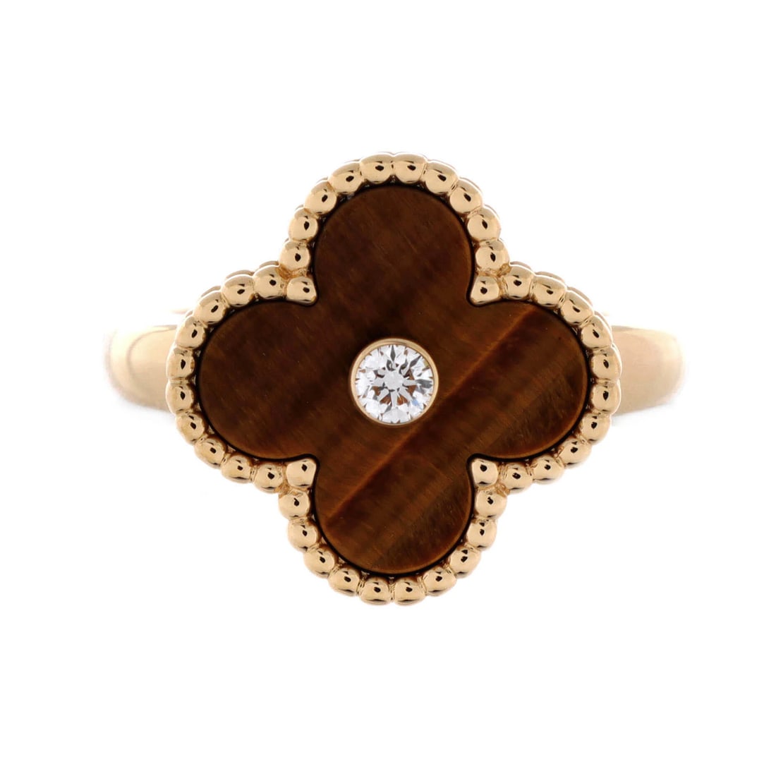 Van Cleef & Arpels Vintage Alhambra Ring 18K Yellow Gold And Tiger Eye: Brand: Van Cleef & Arpels Main Stone: Tiger"S-Eye Metal: 18K Yellow Gold Metal Purity: 18K Ring Size: 5.75 - 51 Type: Ring Color: Yellow Gold Style: 18K Yellow Gold And Tiger Eye With Diamond Material