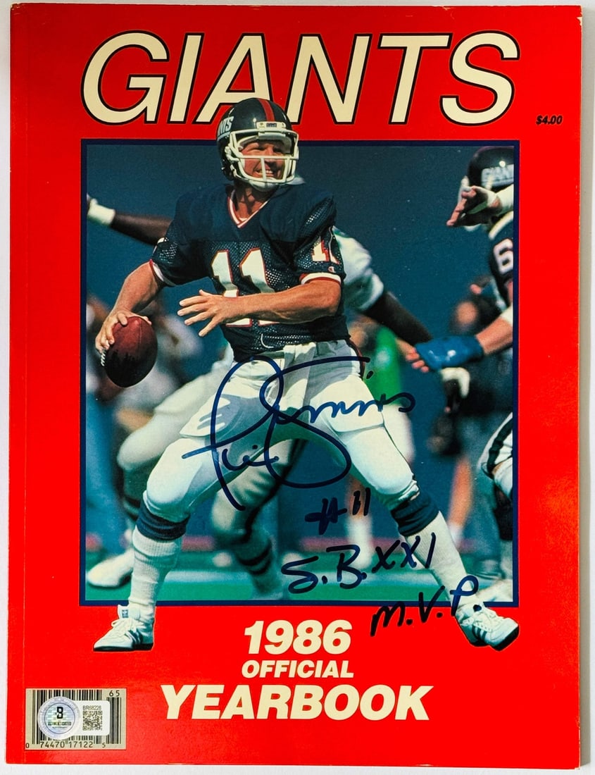 Phil Simms Autographed 1986 Giants Official Yearbook (Beckett) (1 of 2)