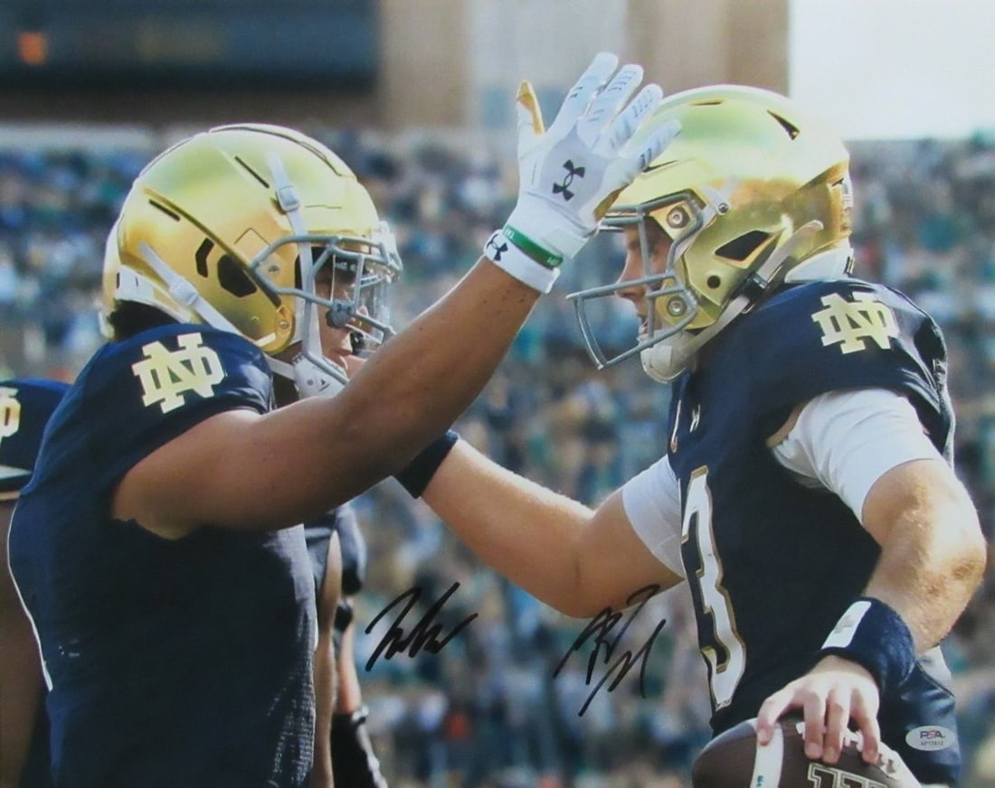 Jaden Greathouse/Riley Leon Autographed 16x20 Photo Notre Dame PSA 195357: Jaden Greathouse/Riley Leon Autographed 16x20 Photo Notre Dame PSA 195357 Autographed 16x20 photo of Notre Dame by Jaden Greathouse and Riley Leon, authenticated by PSA (PSA 195357), original genuine
