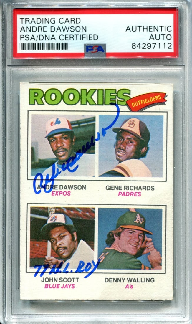 Andre Dawson "77 NL ROY" Autographed 1977 Topps Rookie Card (PSA): Andre Dawson "77 NL ROY" Autographed 1977 Topps Rookie Card (PSA) Andre Dawson autographed 1977 Topps Rookie Card, inscribed '77 NL ROY', signed in blue sharpie with authenticity provided by PSA/DNA.