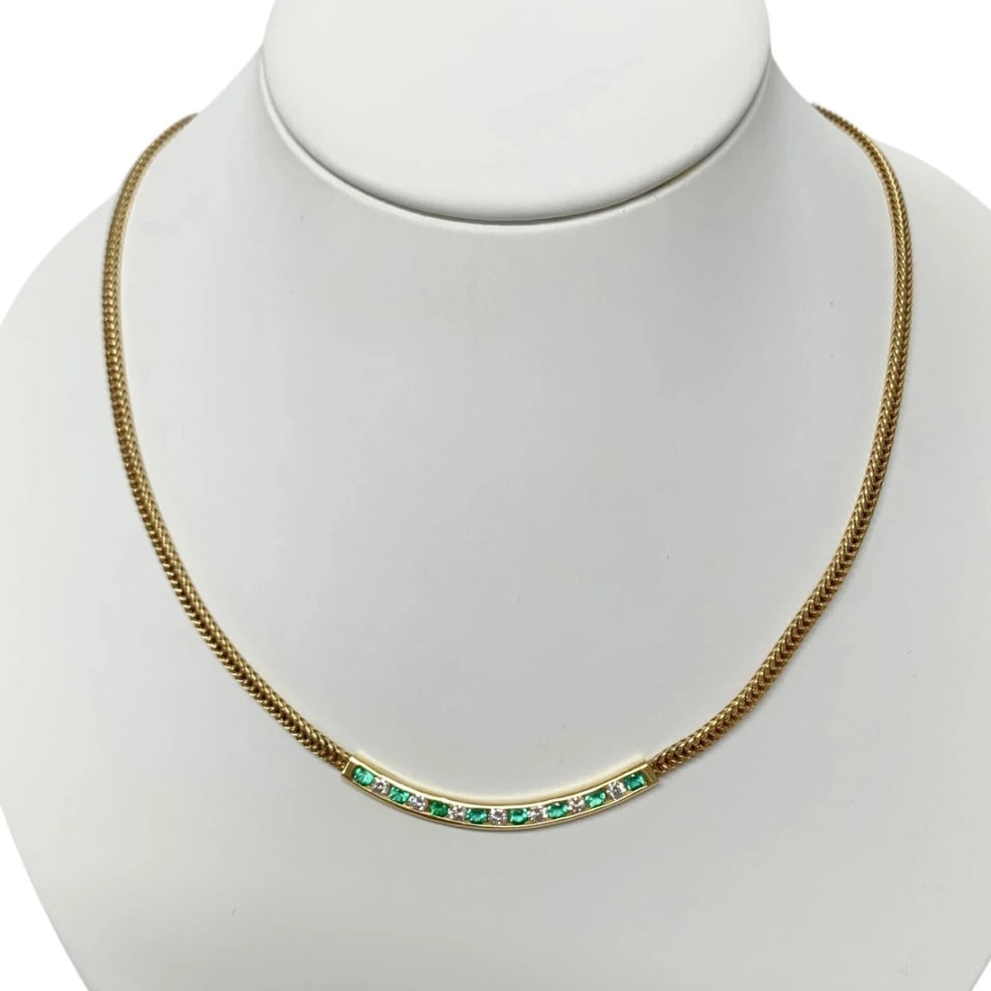 Vintage Tiffany & Co Emerald Diamond 18k Yellow Gold Braided Chain Necklace used: Vintage Tiffany & Co Emerald Diamond 18k Yellow Gold Braided Chain Necklace used Vintage Tiffany & Co. 18k yellow gold braided chain necklace with emerald and diamond, 16.1 inches long, used, signed,