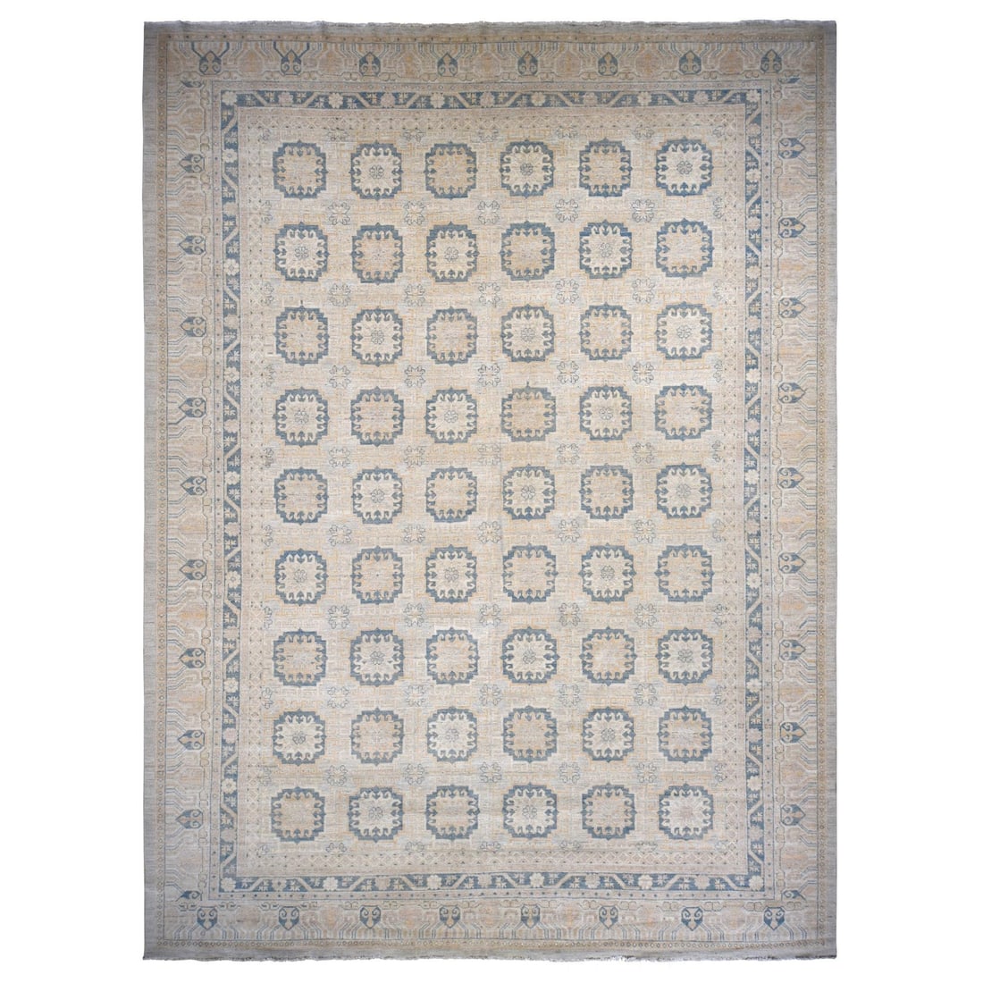 Rug 13'x17'7" Ivory White Wash Khotan Hand Knotted Pure Wool Oversized: Rug 13'x17'7" Ivory White Wash Khotan Hand Knotted Pure Wool Oversized This oversized 13' x 17'7" Khotan rug is hand-knotted from pure wool in ivory, with an oriental pattern, and is in good condition