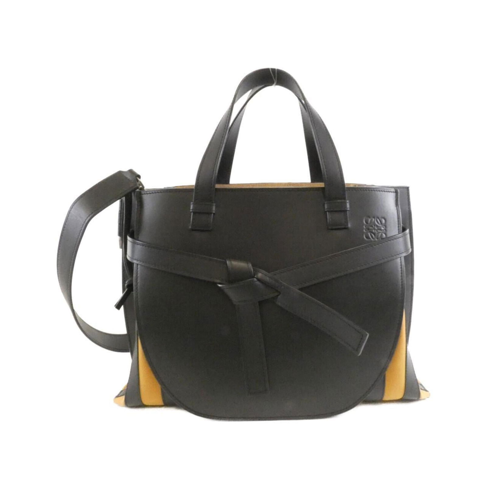 Loewe Canvas Handbag: Loewe Canvas Handbag Loewe canvas handbag crafted from canvas and leather, measuring 25cm x 38cm x 18cm, in very good used condition. Item Specifics: Brand: Loewe Type: Handbag Material: Canvas , Leat