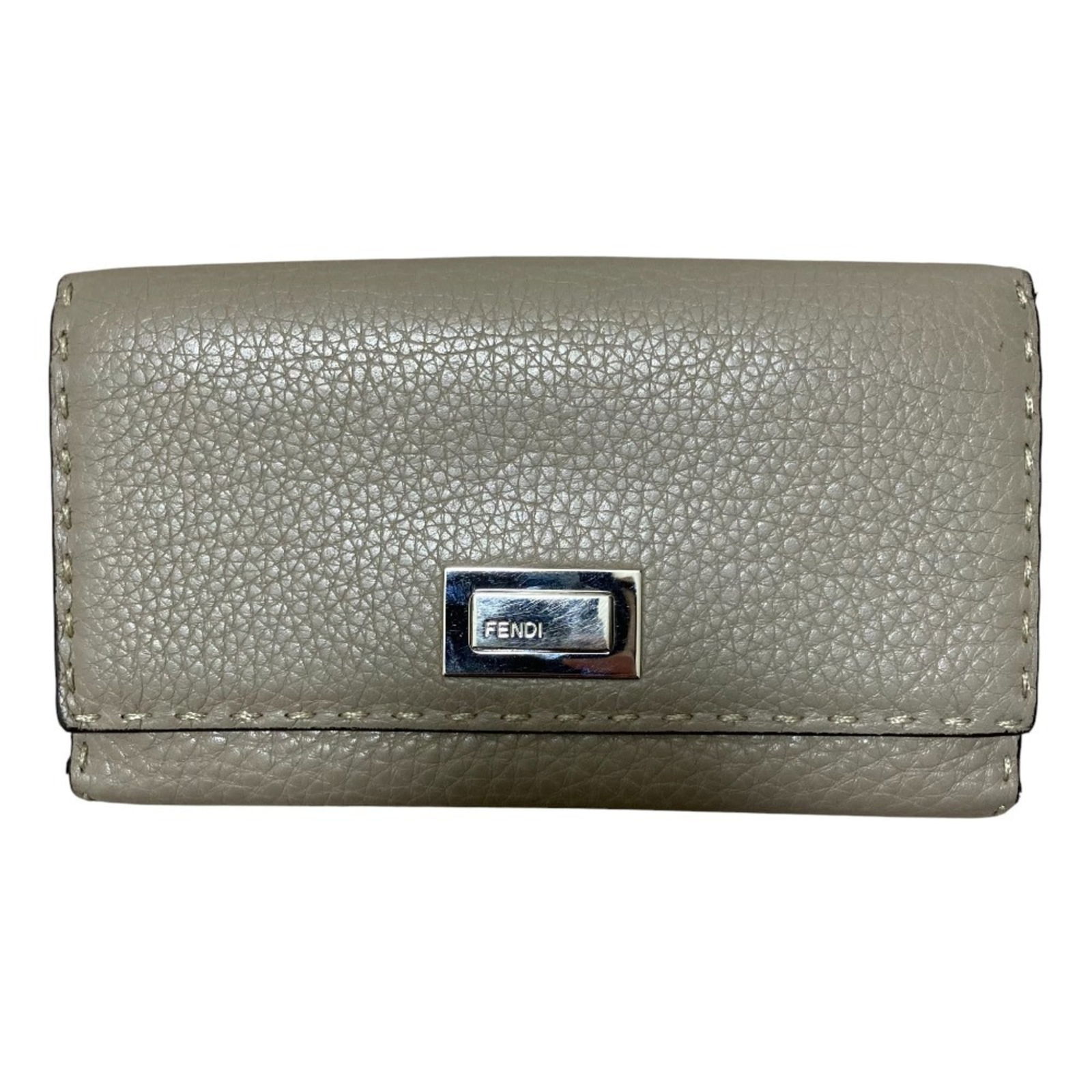 Long Wallet by Fendi: Long Wallet by Fendi This Fendi long wallet is a bi-fold design in grayish color, measuring 11cm x 8cm x 2cm, and is in very good used condition with minor signs of wear. Item Specifics: Brand: Fendi