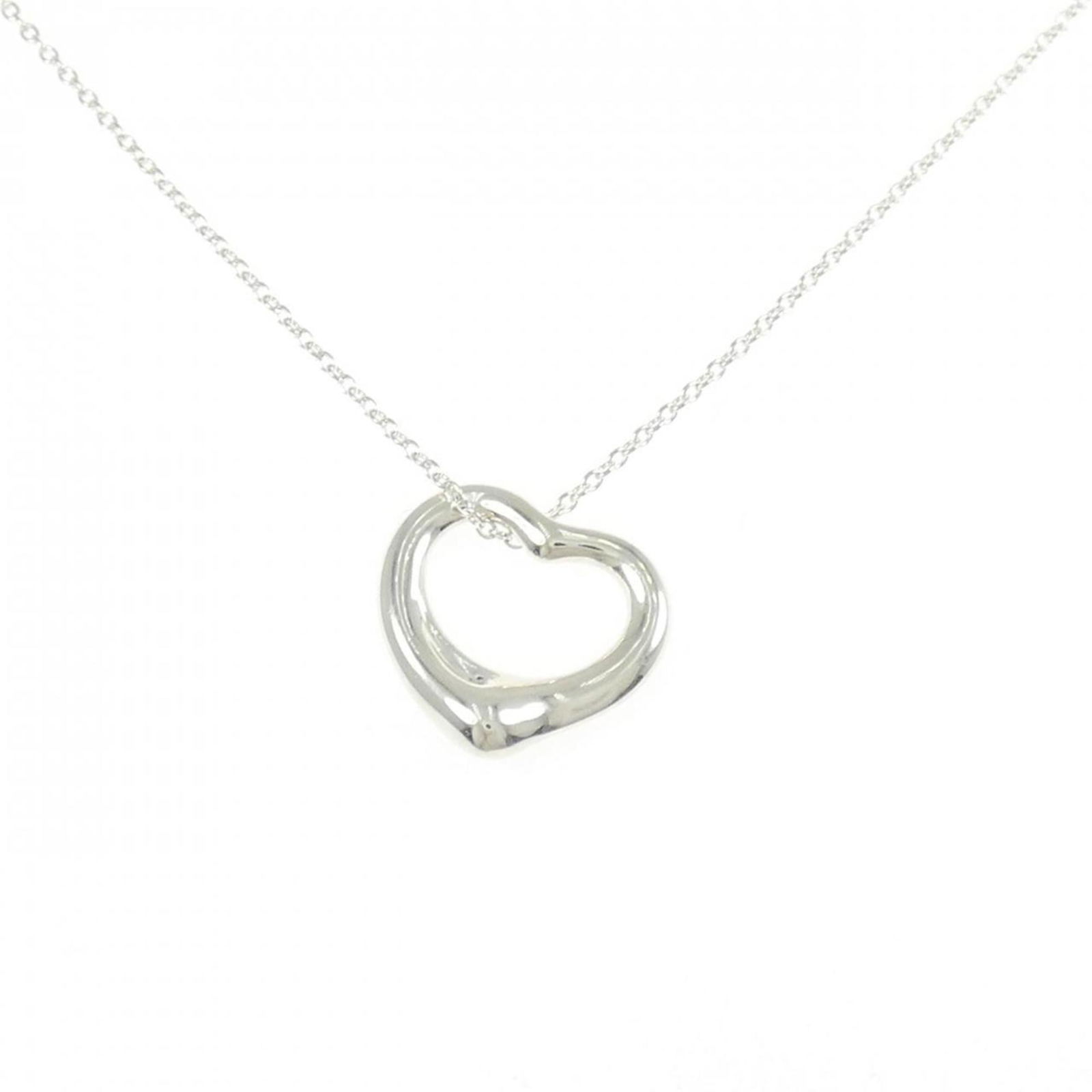 925 Tiffany Silver: 925 Tiffany Silver Tiffany silver necklace for women, made of 925 sterling silver, featuring a 43 cm neck circumference and a pendant size of 15.1 mm x 15.6 mm, in very good used condition. Item Speci