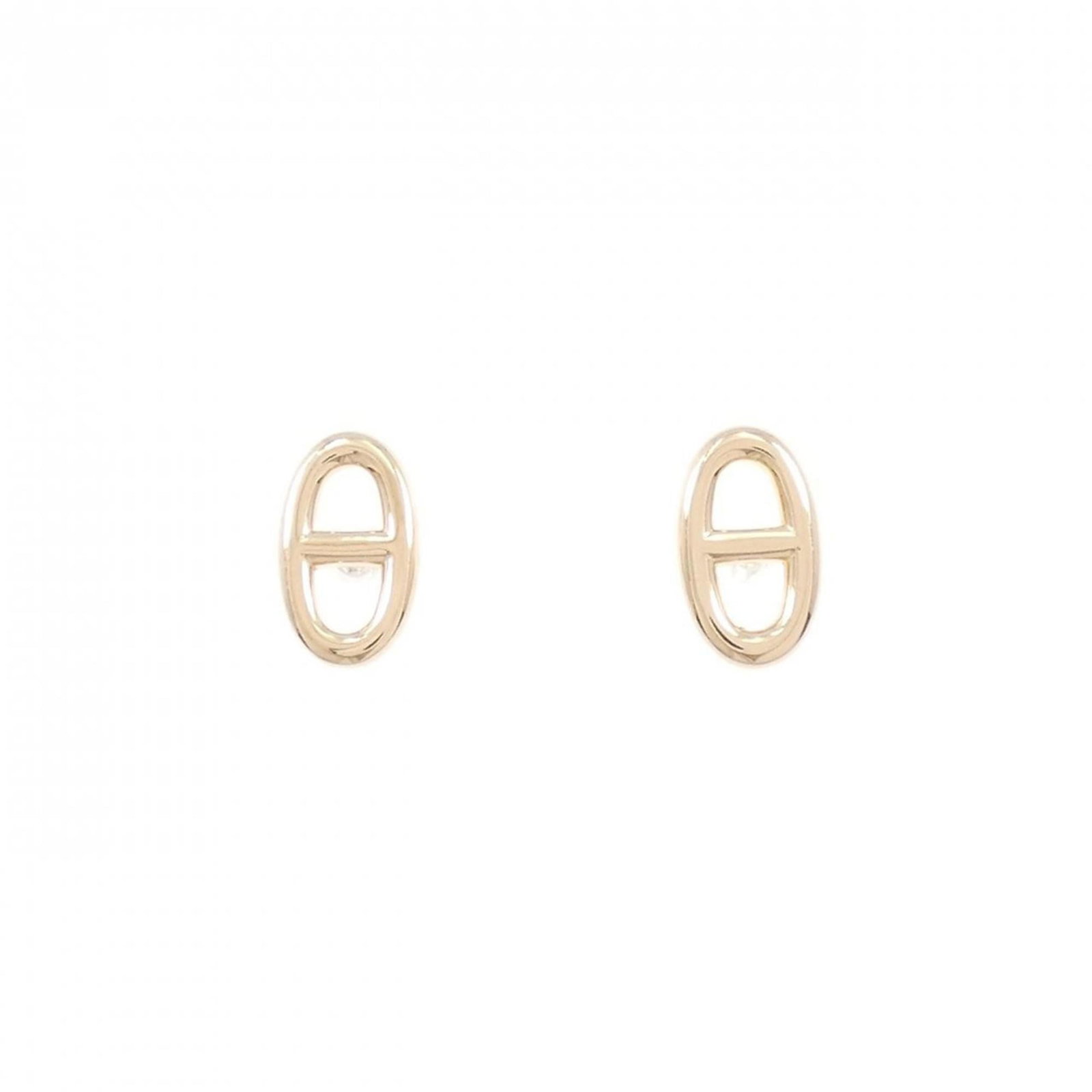 Hermes Pink Gold Stud Earrings: Hermes Pink Gold Stud Earrings Hermes stud earrings made of 18K pink gold, measuring 9.30mm x 5.50mm (0.37'' x 0.22''), are in very good condition with minor traces of usage. Item Specifics: Brand: He