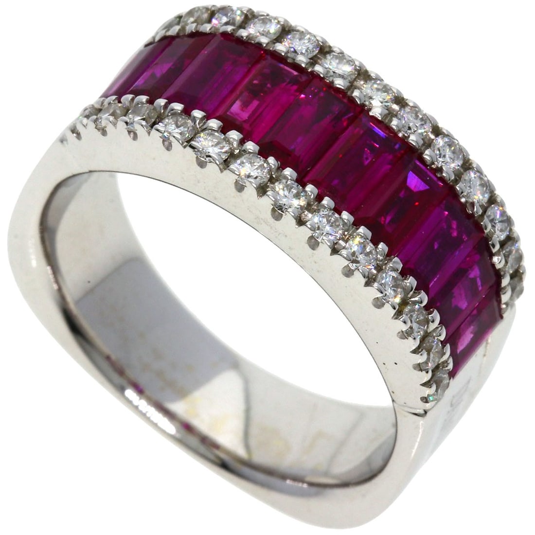 Mystery Setting Ruby Diamond Ring in K18 White Gold - Damiani: Mystery Setting Ruby Diamond Ring in K18 White Gold - Damiani The Mystery Setting Ruby Diamond Ring by Damiani is crafted from K18 white gold, featuring a ruby main stone and is sized 7.75 (US), made