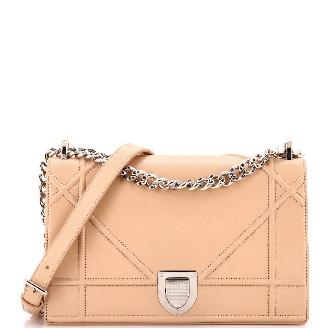 Diorama Flap Bag Small Lambskin by Christian Dior: Diorama Flap Bag Small Lambskin by Christian Dior The Christian Dior Diorama Flap Bag is a small crossbody bag made of lambskin leather in a neutral color, with a black fabric interior and silver