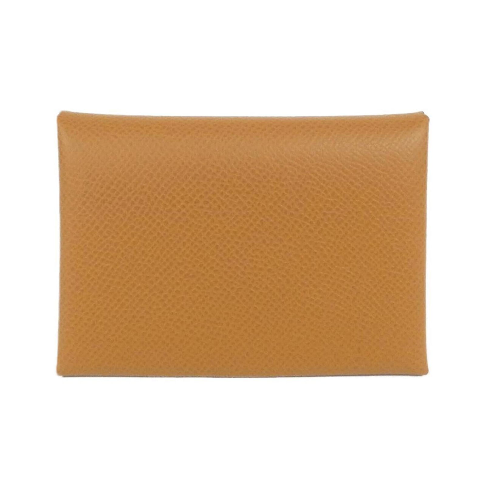 Hermes Epsom Leather Coin Purse/ Coin Case: Hermes Epsom Leather Coin Purse/ Coin Case Hermes' coin purse made of brown Epsom leather measures 7cm x 11cm x 1.5cm and is in very good used condition with minor scratches. Item Specifics: Brand: