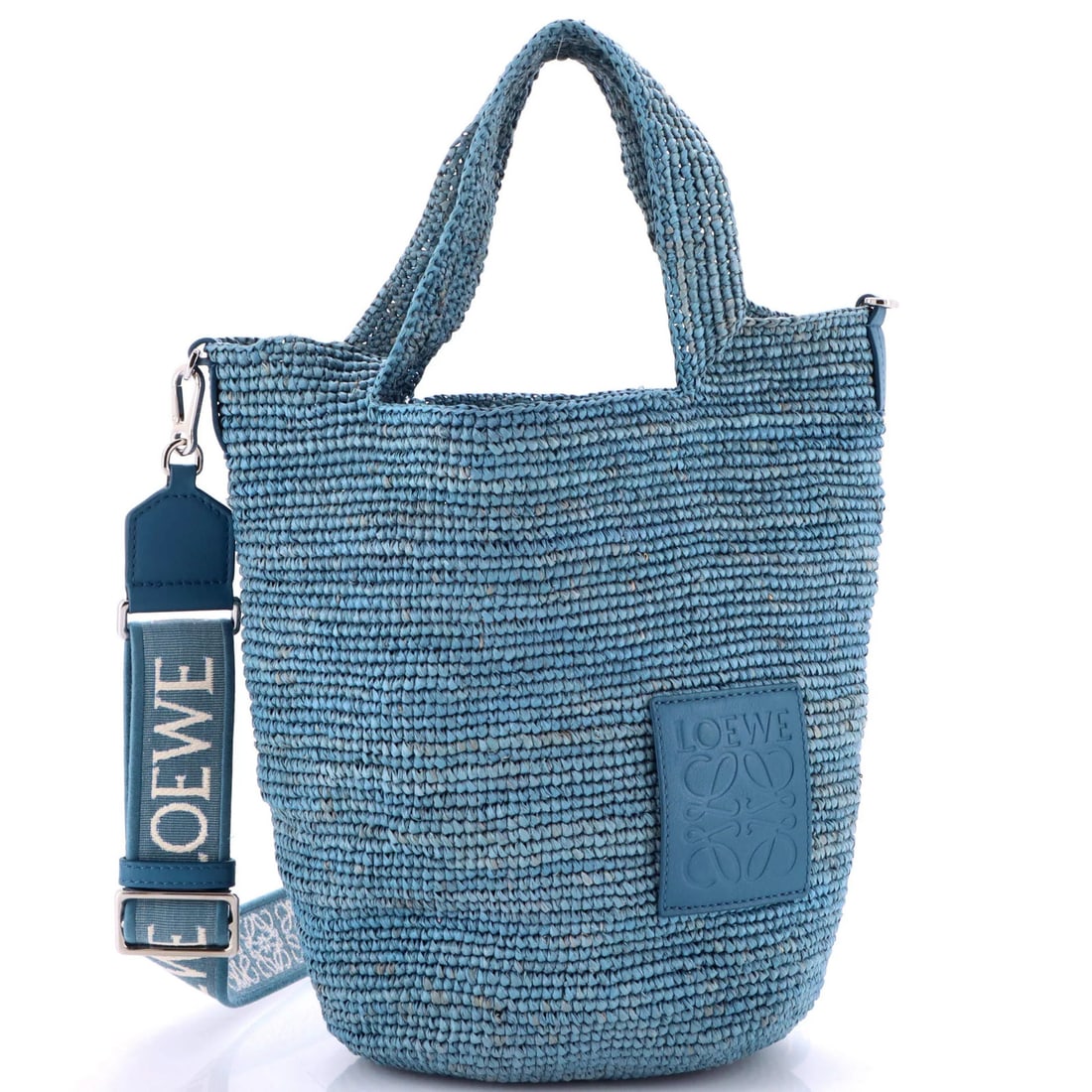 Loewe Large Slit Tote in Straw: Loewe Large Slit Tote in Straw Loewe Large Slit Tote made of blue straw, measuring 15" in height and 11" in width, in very good condition with minor wear and fraying. Item Specifics: Brand: Loewe Exte