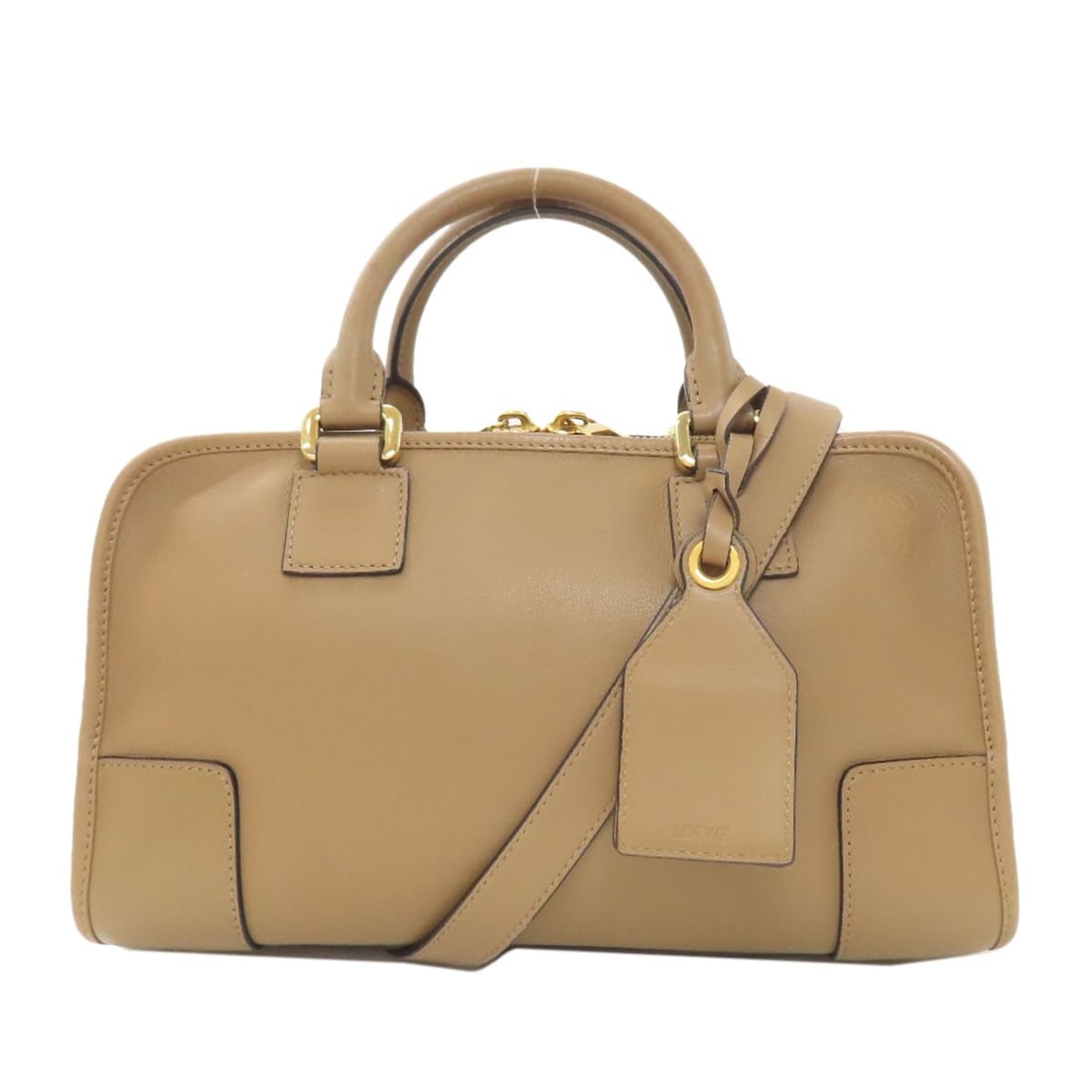 LOEWE Calf Amazona 2WAY Handbag: LOEWE Calf Amazona 2WAY Handbag The LOEWE Calf Amazona 2WAY Handbag is crafted from brown calf leather and made in Spain. Item Specifics: Brand: LOEWE Style: Handbag Exterior Material: Calf Exterior C