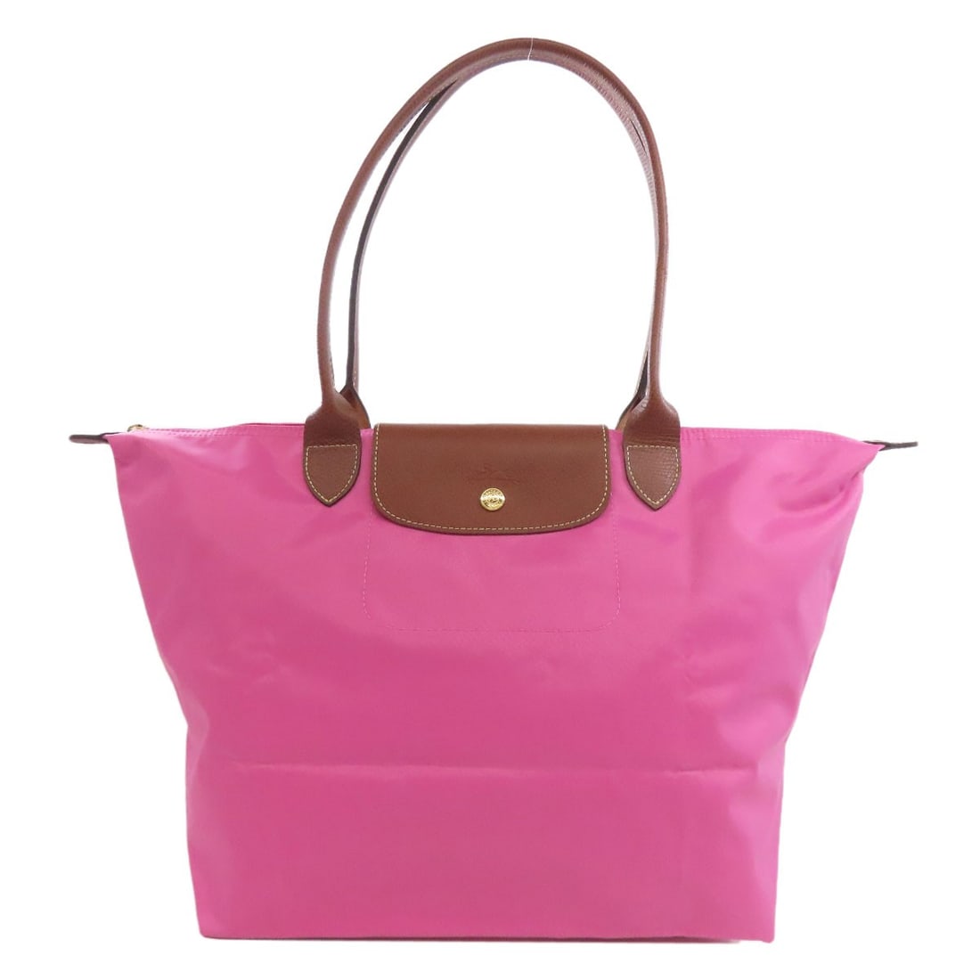 Longchamp Le Pliage Nylon Tote Bag: Longchamp Le Pliage Nylon Tote Bag The Longchamp Le Pliage tote bag is constructed from pink nylon, creating a stylish and practical accessory. Item Specifics: Brand: Longchamp Style: Tote Bag Exterio
