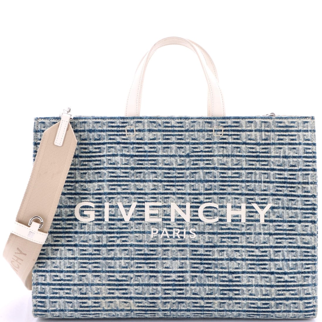 Givenchy Medium G-Tote 4G Denim: Givenchy Medium G-Tote 4G Denim Givenchy G-Tote 4G denim bag in blue, medium size, with measurements of 10" height, 15" width, and 5.5" depth. Condition is very good with some exterior stains and a mo