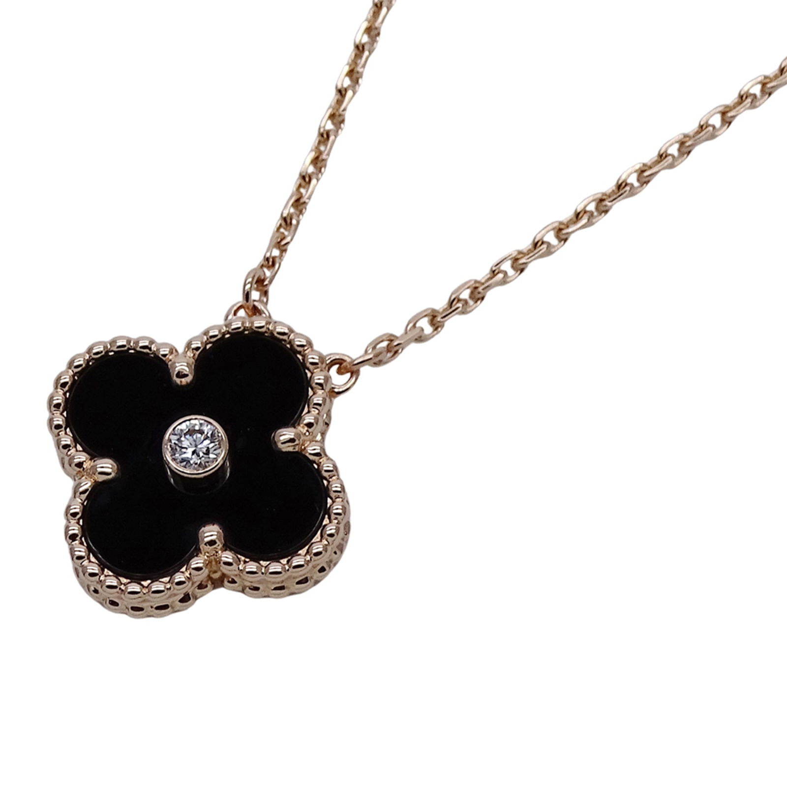 Van Cleef & Arpels 18K Pink Gold: Van Cleef & Arpels 18K Pink Gold This Van Cleef & Arpels Necklace is made of 18K pink gold, features a neck circumference of 38 cm to 42 cm, and a pendant size of 14.6mm x 14.6mm, in like new conditio