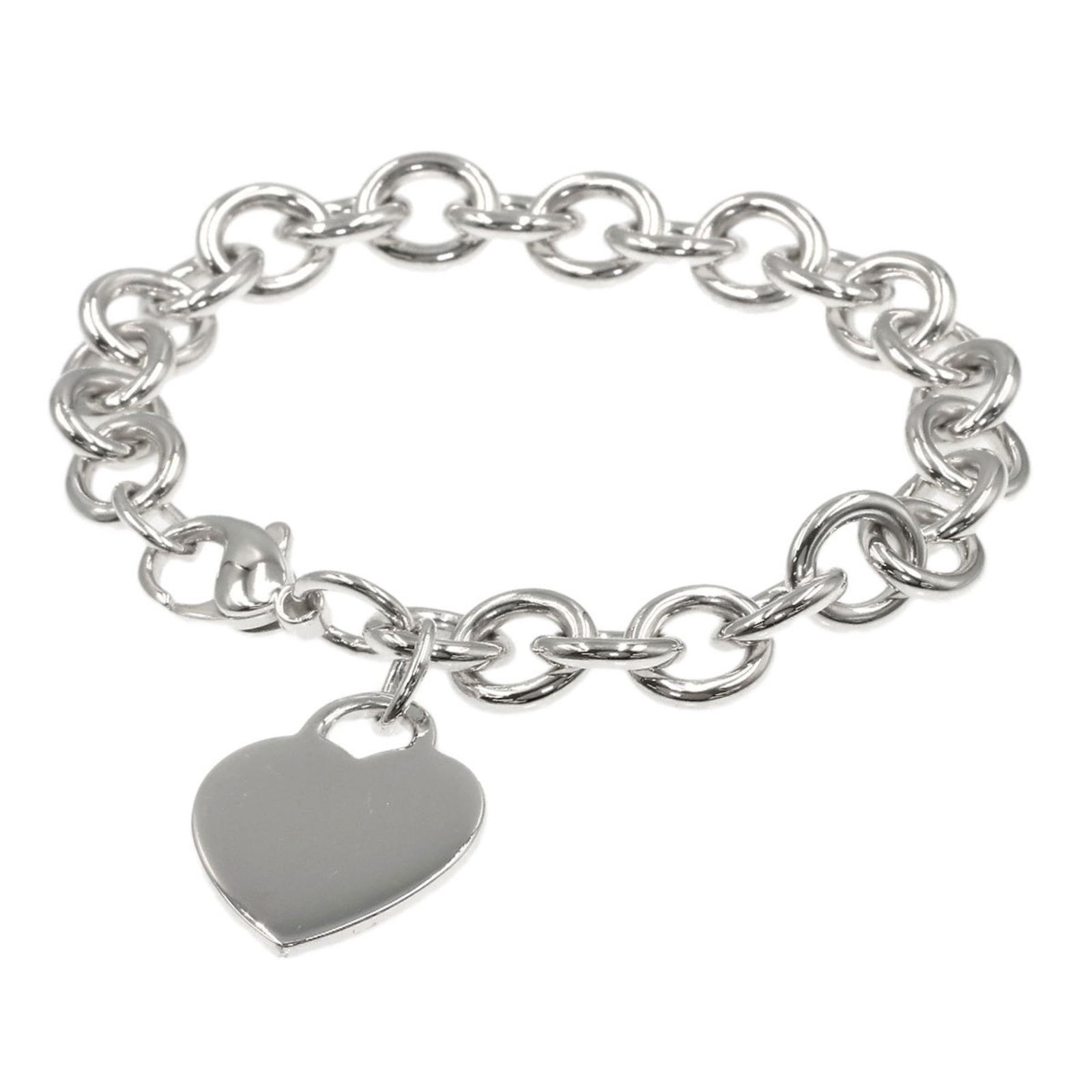Silver Tiffany Charm Bracelet: Silver Tiffany Charm Bracelet Silver charm bracelet by Tiffany, 17cm long, used condition with minor scratches. Item Specifics: Brand: Tiffany Type: Charm Bracelet Gender: Women Material: Silver Lengt