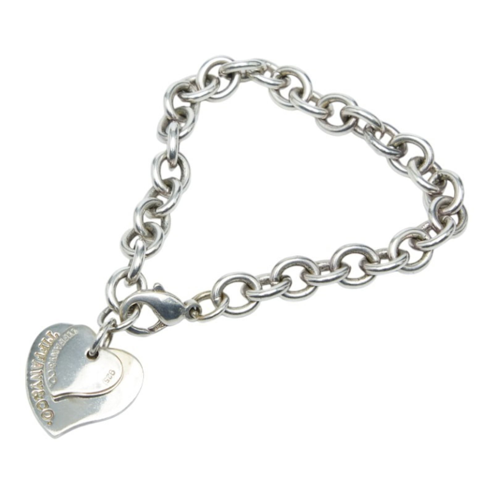 Tiffany Silver 925 Charm Bracelet: Tiffany Silver 925 Charm Bracelet Tiffany silver 925 charm bracelet for women, measuring 19cm (7.48 inches) in length. Condition is good with visible traces of usage including scratches and dirt. Item