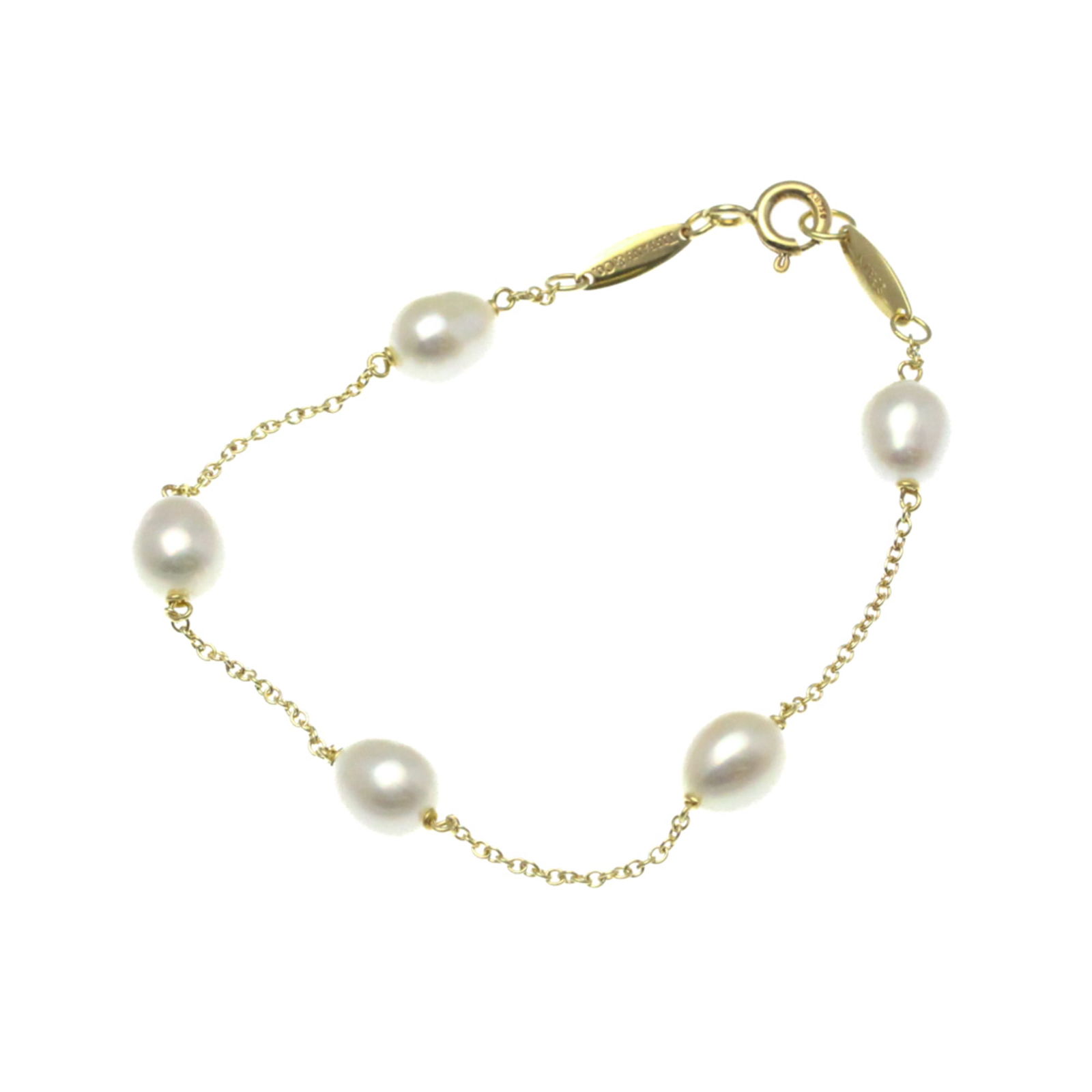 Tiffany Yellow Gold 18K Charm Bracelet: Tiffany Yellow Gold 18K Charm Bracelet Tiffany charm bracelet made from Yellow Gold (18K), suitable for both genders and measuring 15cm in length. Used (very good) condition with minor signs of wear.