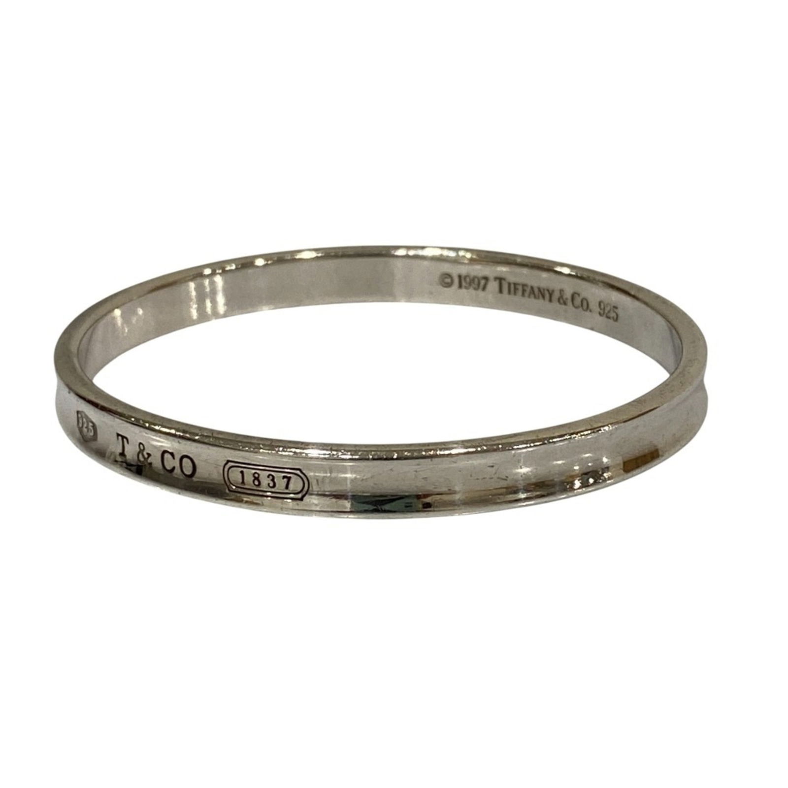 Tiffany Bracelet Charm: Tiffany Bracelet Charm Tiffany charm bracelet for women in silver, measuring 18.1cm in length, in like new condition with hardly any traces of usage. Item Specifics: Brand: Tiffany Type: Charm Bracele