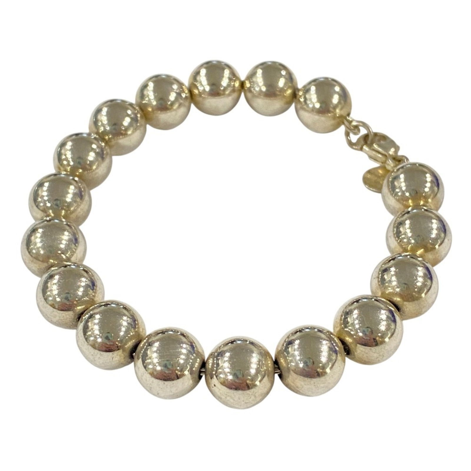 Tiffany Silver 925 Charm Bracelet: Tiffany Silver 925 Charm Bracelet Tiffany Silver 925 Charm Bracelet, unisex, with a total length of 19cm and weighing 19.1g, used in very good condition. Item Specifics: Brand: Tiffany Type: Charm Bra