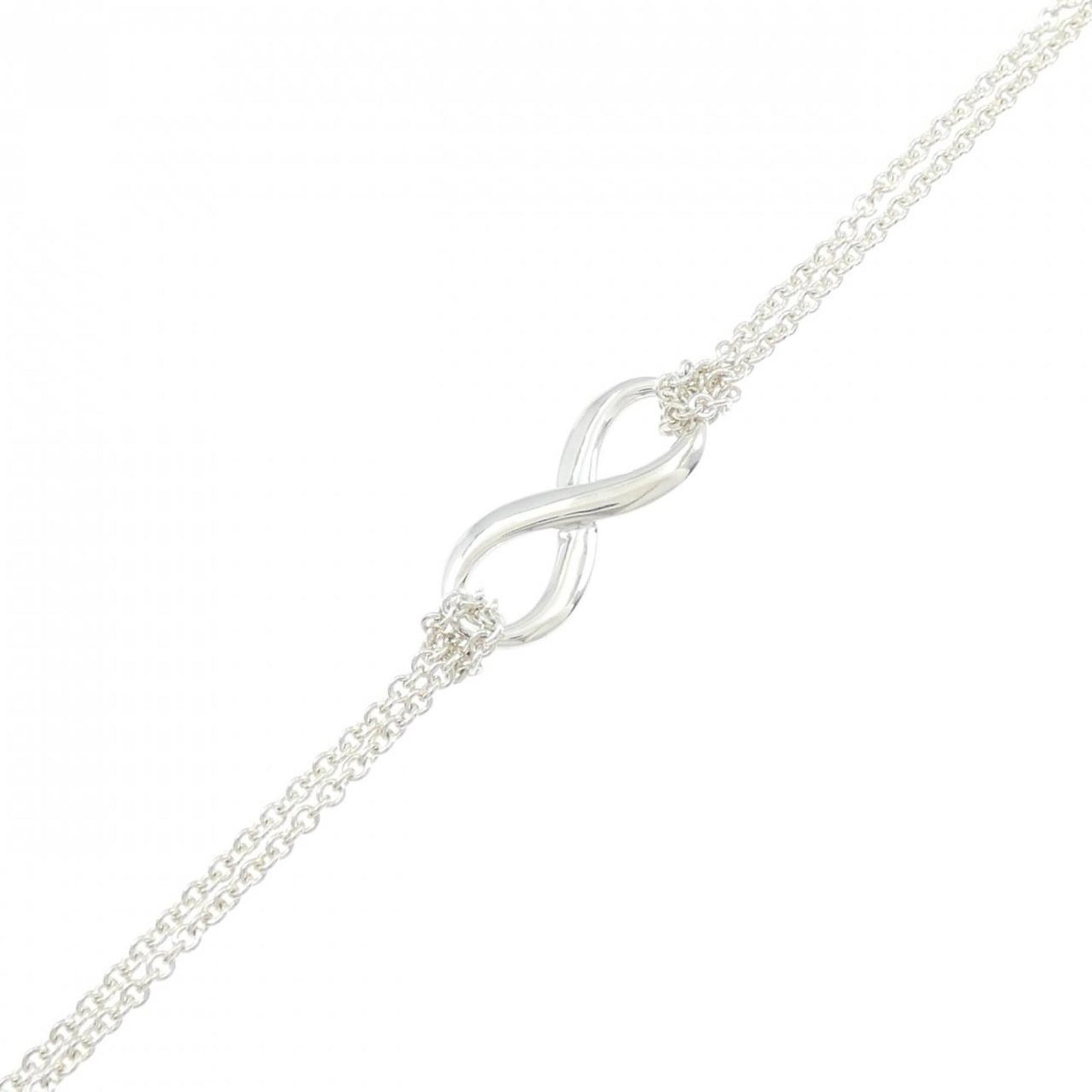 Tiffany Silver 925 Charm Bracelet: Tiffany Silver 925 Charm Bracelet Tiffany charm bracelet for women in Silver 925, 18.5cm long, used in like-new condition with minimal traces of wear. Item Specifics: Brand: Tiffany Type: Charm Bracel